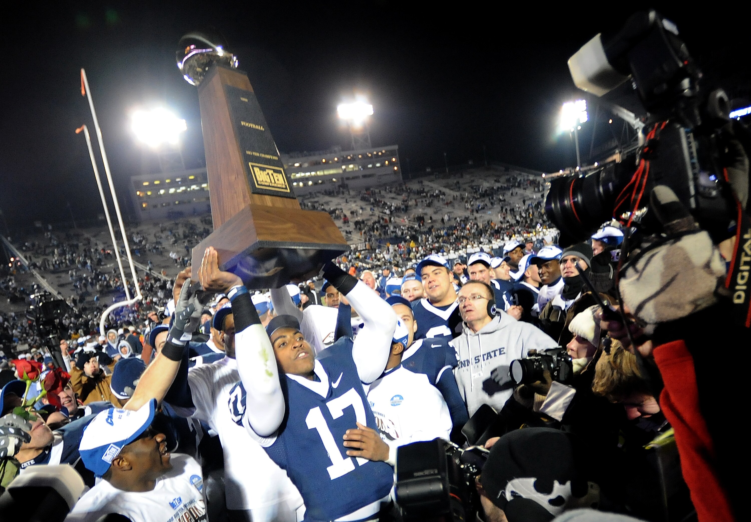 STATE COLLEGE, PA - NOVEMBER 22:  Darryl Clark #17 of the Penn State Nittany Lions raises the Big Ten Conference Championship Trophy after the game against the Michigan State Spartans on November 22, 2008 at Beaver Stadium in State College, Pennsylvania. 