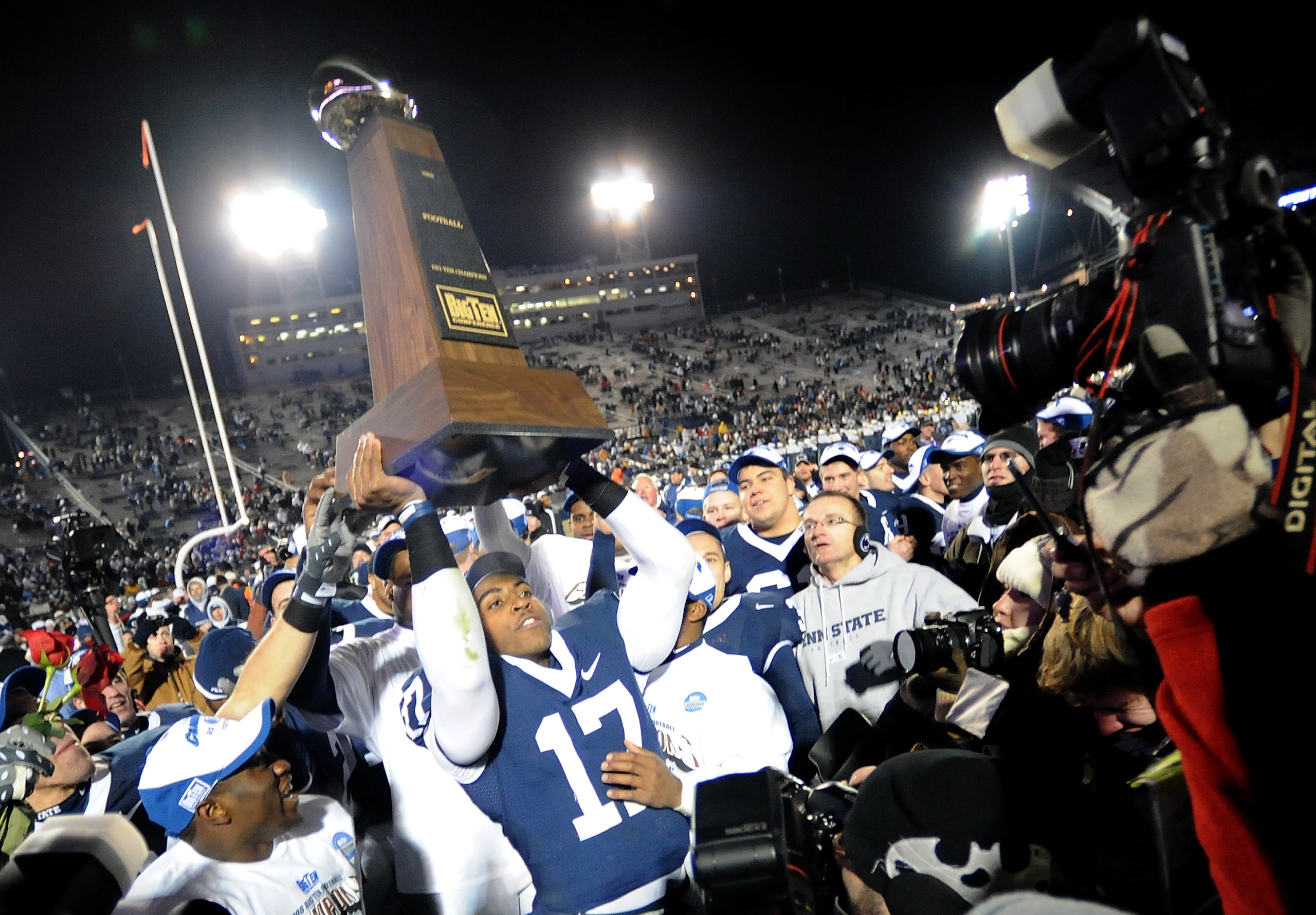 STATE COLLEGE, PA - NOVEMBER 22:  Darryl Clark #17 of the Penn State Nittany Lions raises the Big Ten Conference Championship Trophy after the game against the Michigan State Spartans on November 22, 2008 at Beaver Stadium in State College, Pennsylvania. 