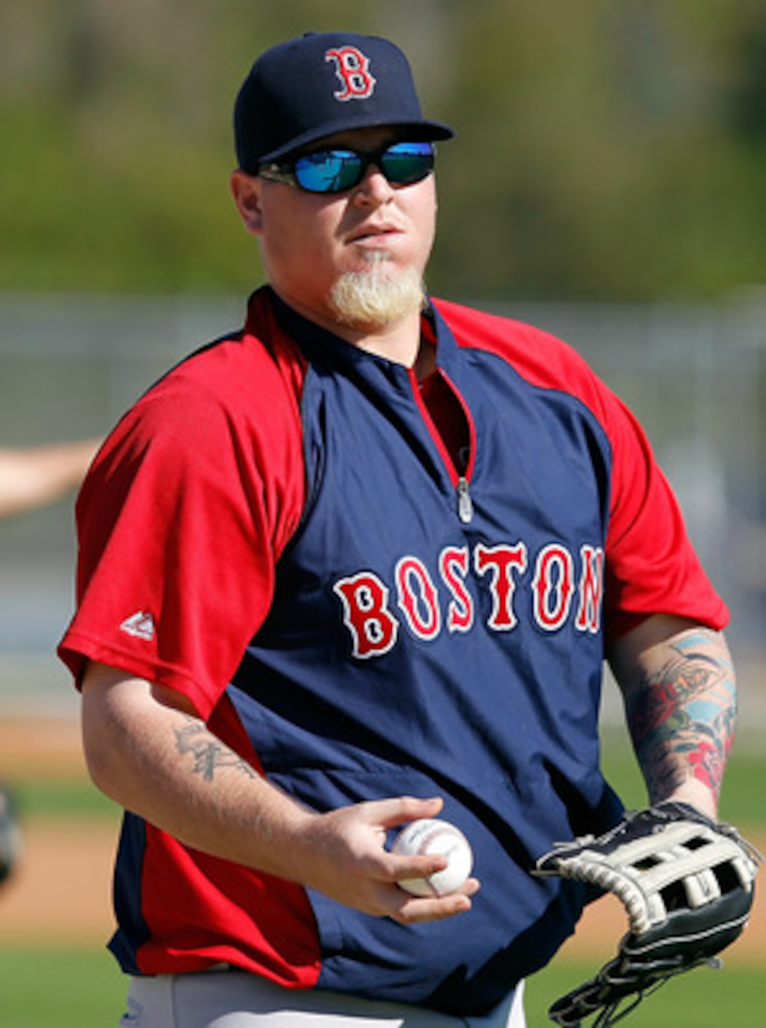 FORT MYERS, FL - FEBRUARY 19:  Pitcher Bobby Jenks #52 of the Boston Red Sox throws during a Spring Training Workout Session at the Red Sox Player Development Complex on February 19, 2011 in Fort Myers, Florida.  (Photo by J. Meric/Getty Images)