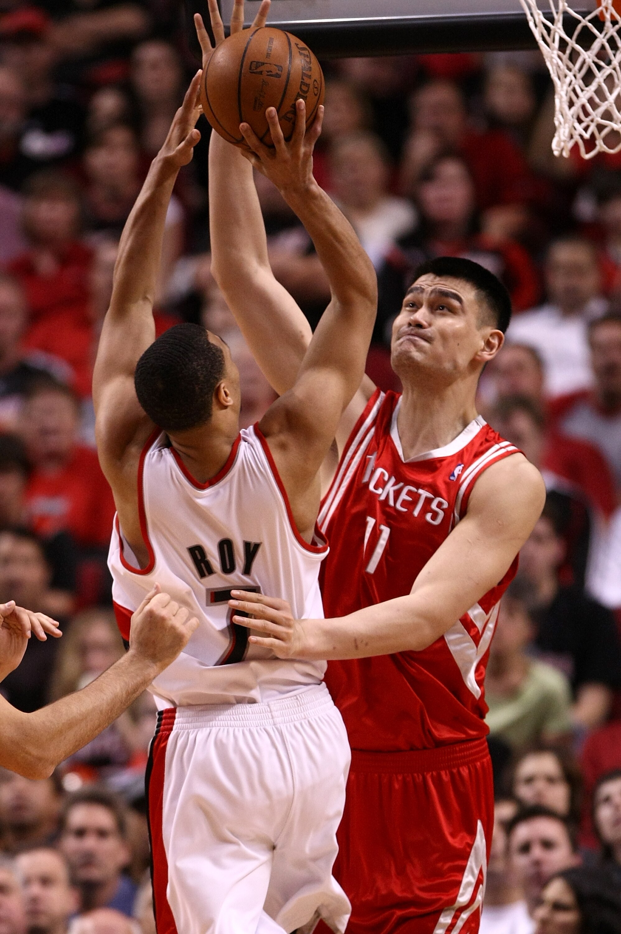 PORTLAND, OR - APRIL 18:  Brandon Roy #7 of the Portland Trail Blazers is guarded by Yao Ming #11 of the Houston Rockets during Game One of the Western Conference Quarterfinals of the 2009 NBA Playoffs on April 18, 2009 at the Rose Garden in Portland, Ore