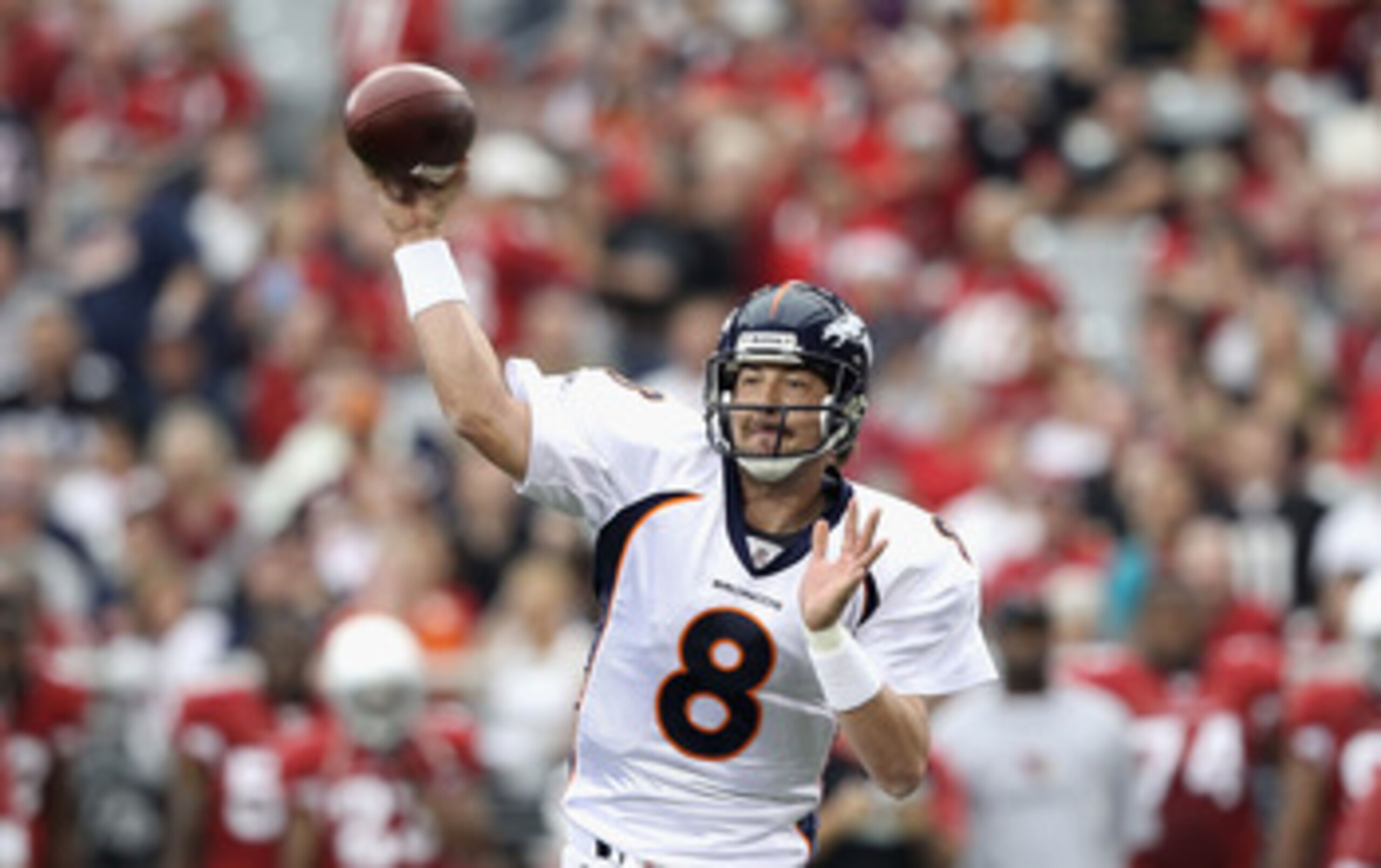 GLENDALE, AZ - DECEMBER 12:  Quarterback Kyle Orton #8 of the Denver Broncos throws a pass during the NFL game against the Arizona Cardinals at the University of Phoenix Stadium on December 12, 2010 in Glendale, Arizona.  (Photo by Christian Petersen/Gett