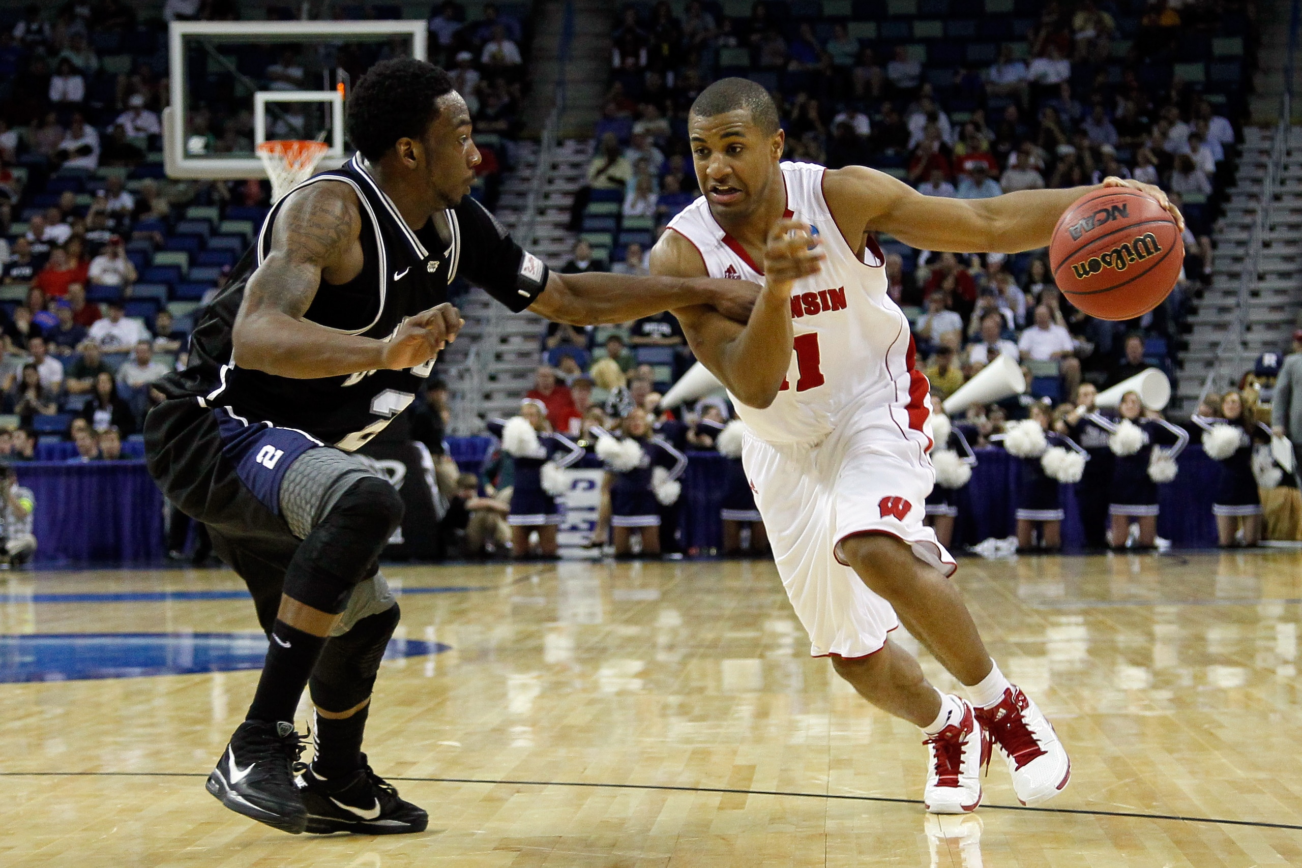 NEW ORLEANS, LA - MARCH 24:  Jordan Taylor #11 of the Wisconsin Badgers drives against Shawn Vanzant #2 of the Butler Bulldogs during the Southeast regional of the 2011 NCAA men's basketball tournament at New Orleans Arena on March 24, 2011 in New Orleans