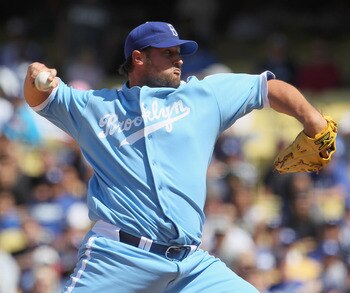 LOS ANGELES, CA - APRIL 21:  Jonathan Broxton #51 of the Los Angeles Dodgers pitches against the Atlanta Braves at Dodger Stadium on April 21, 2011 in Los Angeles, California.  (Photo by Jeff Gross/Getty Images)