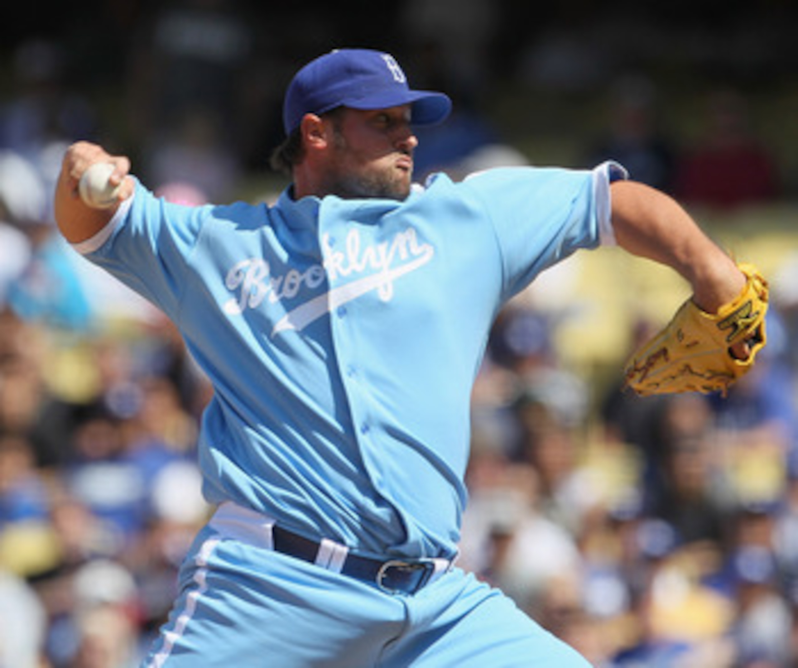 LOS ANGELES, CA - APRIL 21:  Jonathan Broxton #51 of the Los Angeles Dodgers pitches against the Atlanta Braves at Dodger Stadium on April 21, 2011 in Los Angeles, California.  (Photo by Jeff Gross/Getty Images)