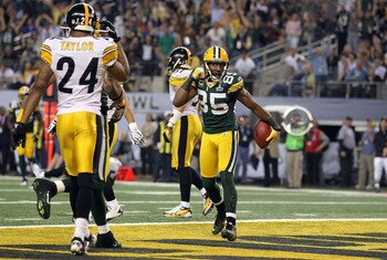 ARLINGTON, TX - FEBRUARY 06:  Greg Jennings #85 of the Green Bay Packers reacts after catching a 21 yard pass for a touchdown against the Pittsburgh Steelers during Super Bowl XLV at Cowboys Stadium on February 6, 2011 in Arlington, Texas. The Packers won