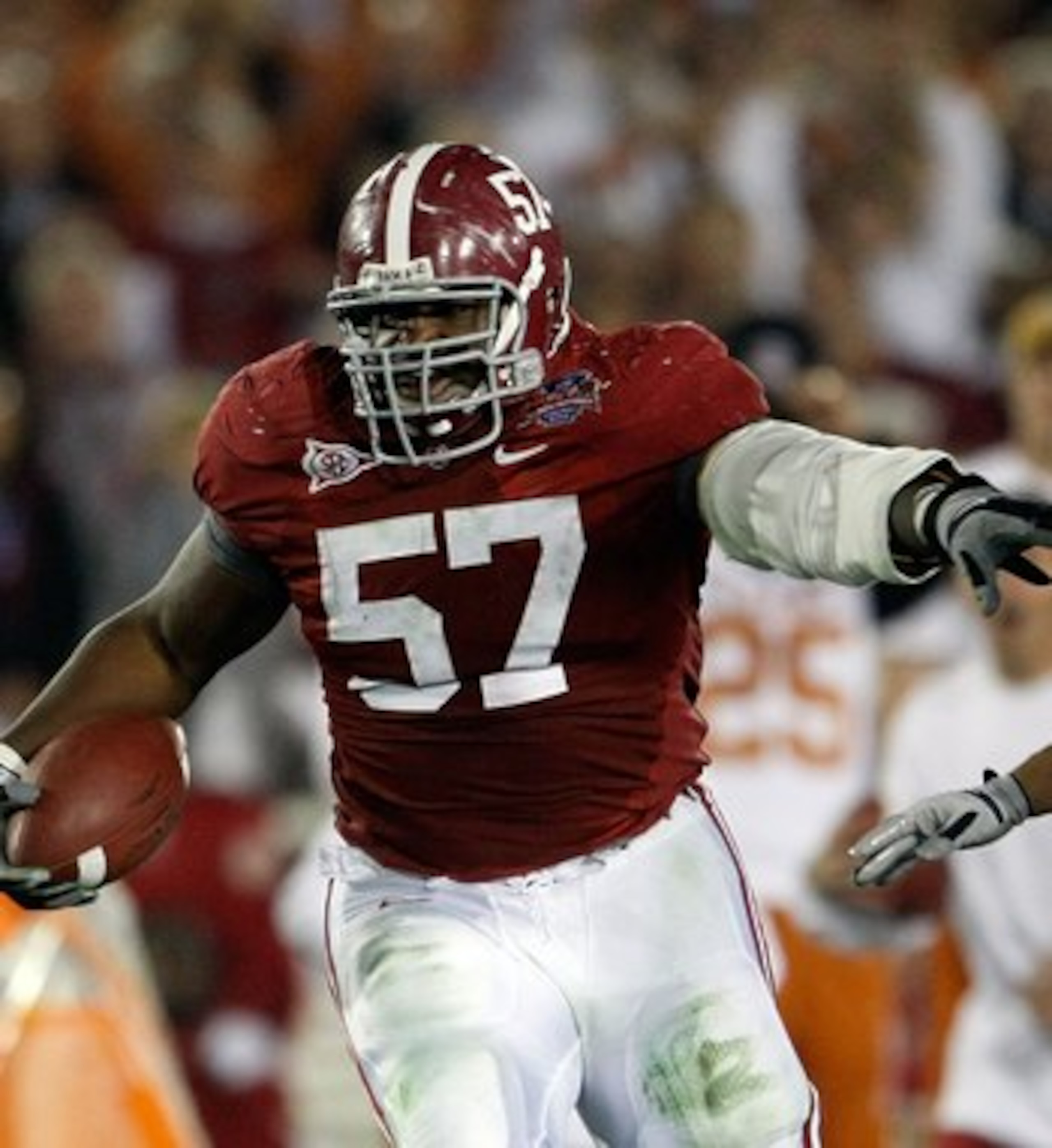 PASADENA, CA - JANUARY 07: Lineman Marcell Dareus #57 of the Alabama Crimson Tide runs with the ball after an interception against the Texas Longhorns during the second quarter of the Citi BCS National Championship game at the Rose Bowl on January 7, 201 PASADENA, CA - JANUARY 07: Lineman Marcell Dareus #57 of the Alabama Crimson Tide runs with the ball after an interception against the Texas Longhorns during the second quarter of the Citi BCS National Championship game at the Rose Bowl on January 7, 201
