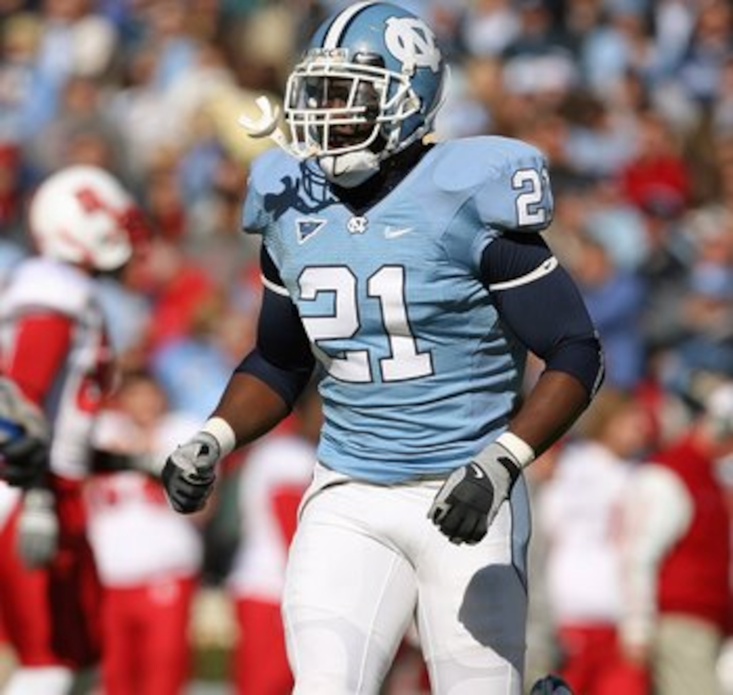 CHAPEL HILL, NC - NOVEMBER 22: Da'Norris Searcy #21 of the North Carolina Tar Heels runs on the field during the game the North Carolina State Wolfpack at Kenan Stadium on November 22, 2008 in Chapel Hill, North Carolina. (Photo by Streeter Lecka/Getty I CHAPEL HILL, NC - NOVEMBER 22: Da'Norris Searcy #21 of the North Carolina Tar Heels runs on the field during the game the North Carolina State Wolfpack at Kenan Stadium on November 22, 2008 in Chapel Hill, North Carolina. (Photo by Streeter Lecka/Getty I