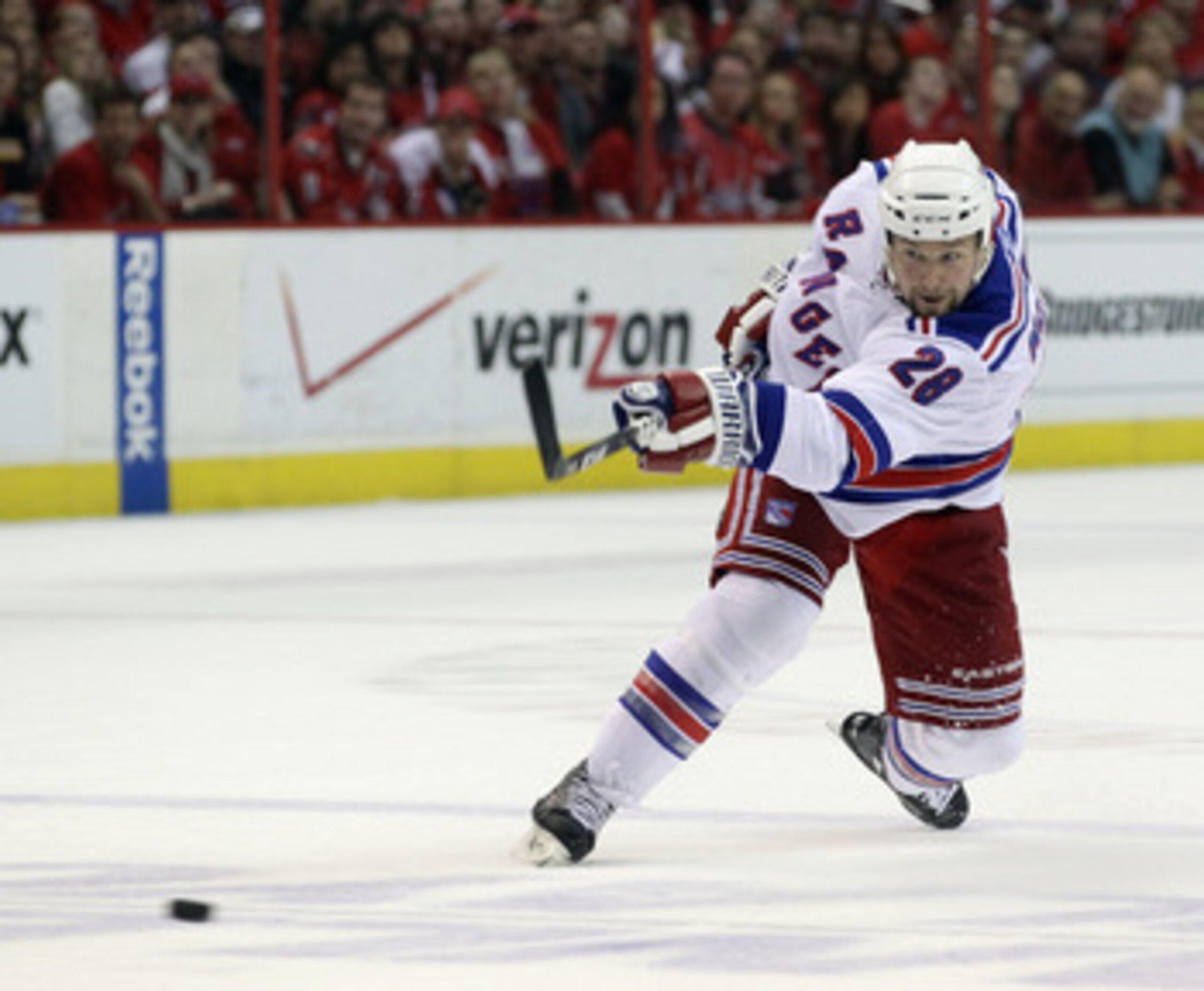 WASHINGTON, DC - APRIL 13: Bryan McCabe #28 of the New York Rangers takes the shot against the Washington Capitals in Game One of the Eastern Conference Quarterfinals during the 2011 NHL Stanley Cup Playoffs at Verizon Center on April 13, 2011 in Washingt