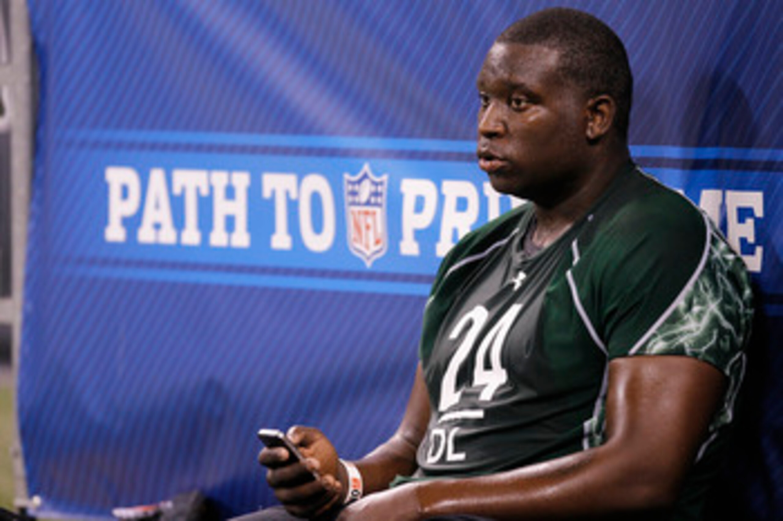 INDIANAPOLIS, IN - FEBRUARY 28: Defensive lineman Jarvis Jenkins of Clemson takes a break during the 2011 NFL Scouting Combine at Lucas Oil Stadium on February 28, 2011 in Indianapolis, Indiana. (Photo by Joe Robbins/Getty Images)