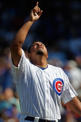 CHICAGO - JUNE 20: Starting pitcher Carlos Zambrano #38 of the Chicago Cubs points to the sky after finishing an inning pitching against the Los Angeles Angels of Anaheim at Wrigley Field on June 20, 2010 in Chicago, Illinois. The Cubs defeated the Angels