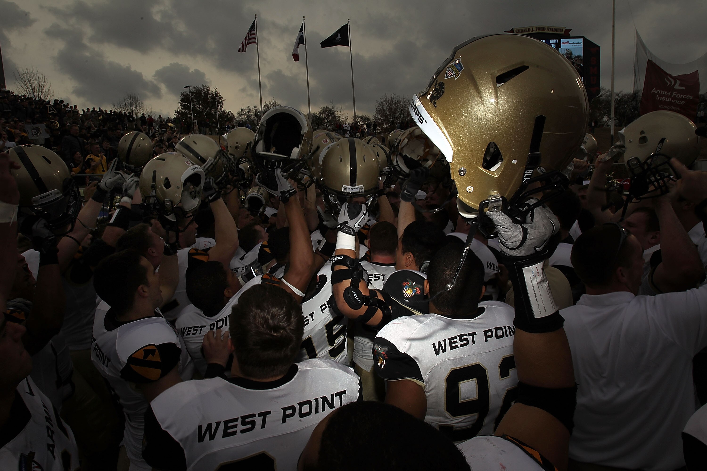 DALLAS, TX - DECEMBER 30:  The Army Black Knights celebrate a 16-14 win against the SMU Mustangs during the Bell Helicopter Armed Forces Bowl at Gerald J. Ford Stadium on December 30, 2010 in Dallas, Texas.  (Photo by Ronald Martinez/Getty Images)
