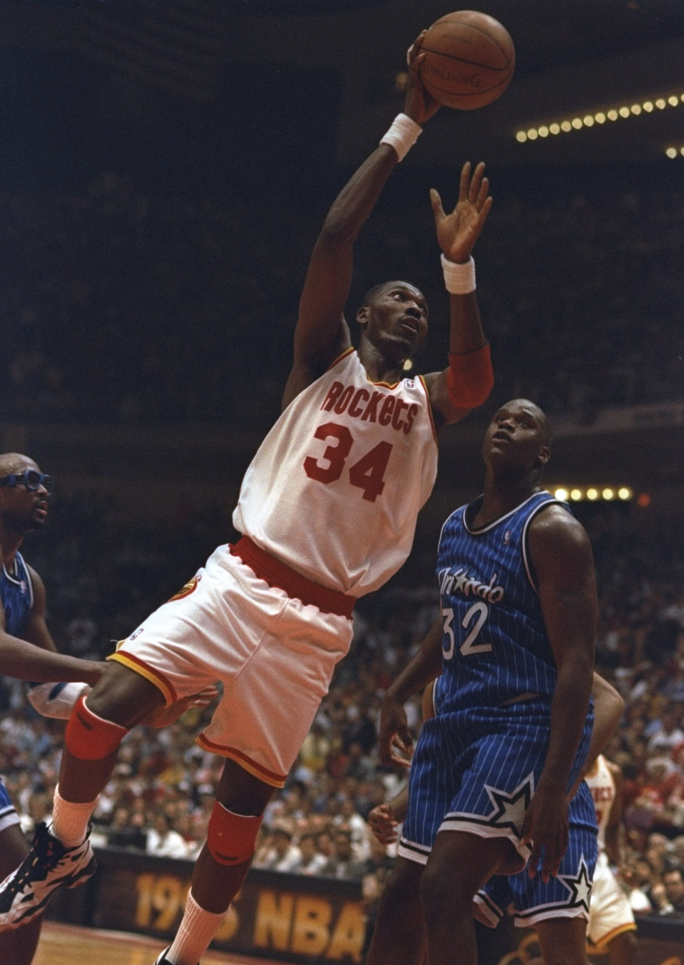 14 Jun 1995:  Center Hakeen Olajuwon of the Houston Rockets goes up for two during a Finals game against the Orlando Magic at The Summit in Houston, Texas.  The Rockets won the game, 113-101. Mandatory Credit: Allsport  /Allsport Mandatory Credit: Allspor