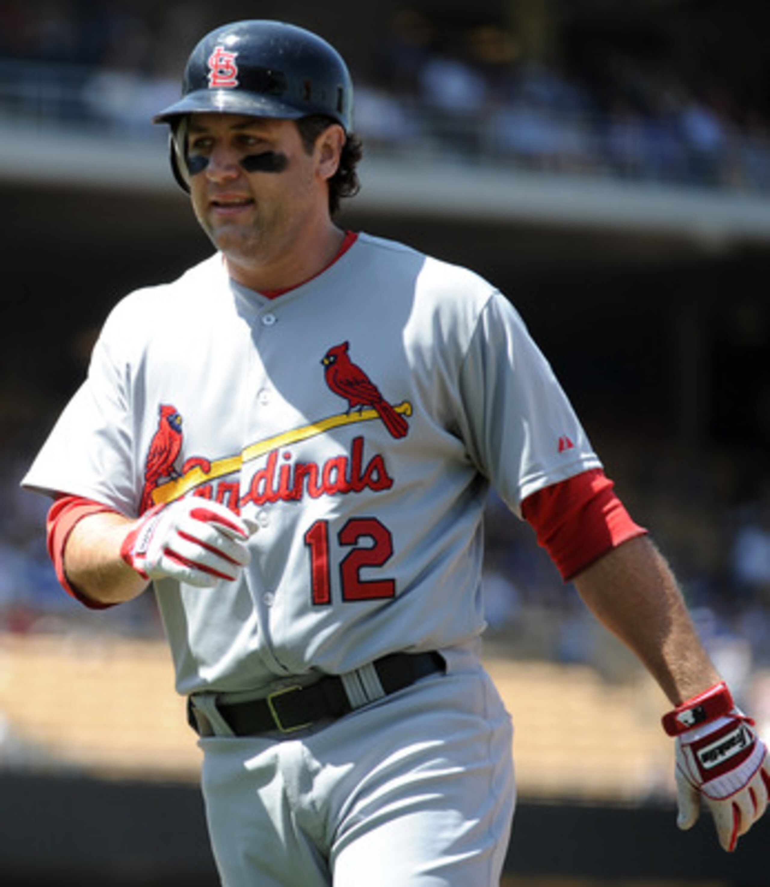 LOS ANGELES, CA - APRIL 17:  Lance Berkman #12 of the St. Louis Cardinals leaves heads to the dugout after his at bat against the Los Angeles Dodgers at Dodger Stadium on April 17, 2011 in Los Angeles, California.  (Photo by Harry How/Getty Images)