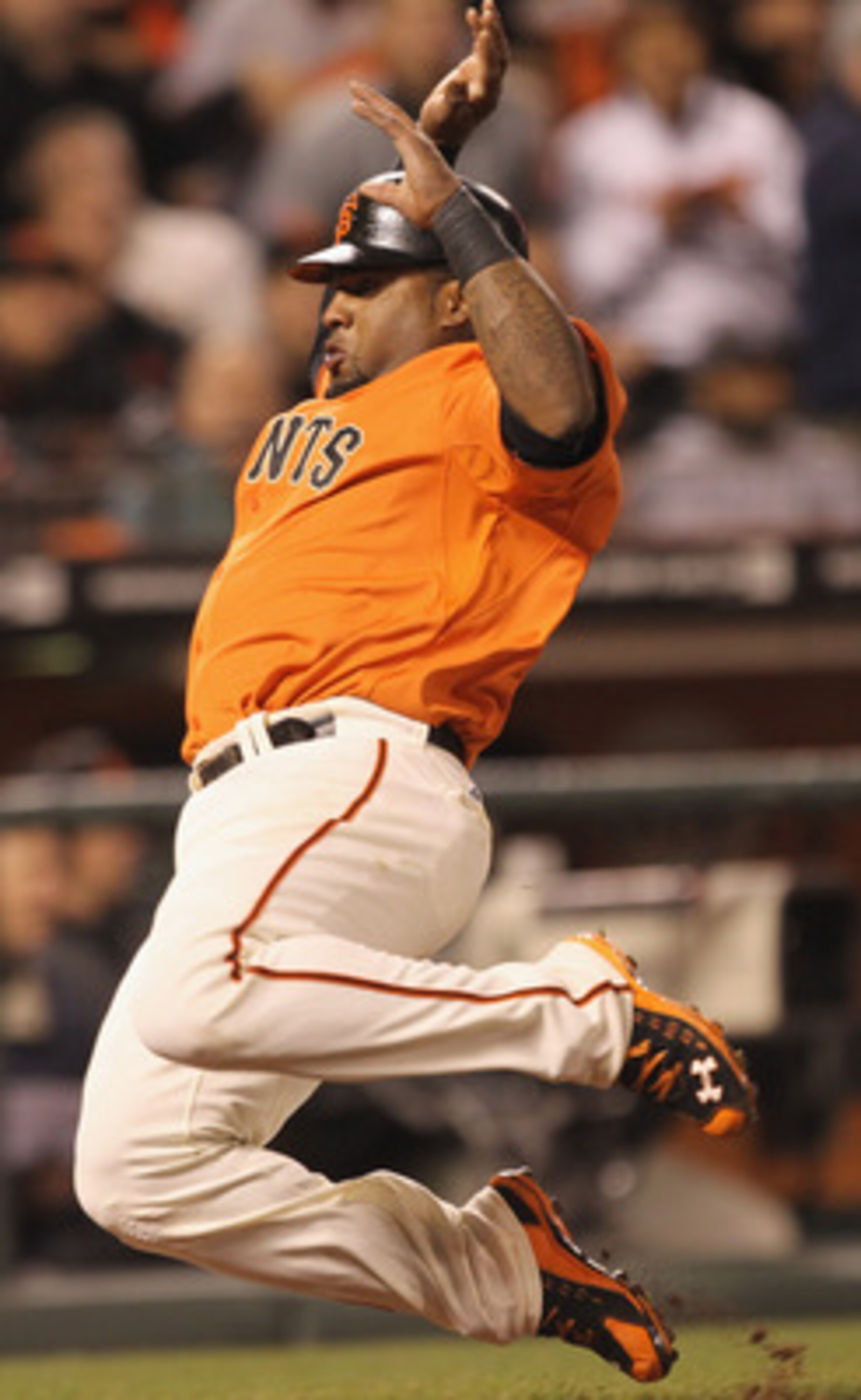 SAN FRANCISCO, CA - APRIL 22:  Pablo Sandoval #48 of the San Francisco Giants scores on a ground out by Pat Burrell #5 in the seventh inning of their game against the Atlanta Braves at AT&T Park on April 22, 2011 in San Francisco, California.  (Photo by E