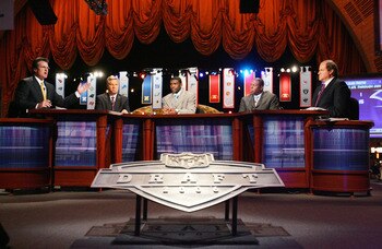NEW YORK - APRIL 29:  (L-R) Mel Kiper, Chris Mortensen, Michael Irvin, Tom Jackson and Chris Berman of ESPN broadcast their coverage during the 2006 NFL Draft on April 29, 2006 at Radio City Music Hall in New York, New York. (Photo by Chris Trotman/Getty 