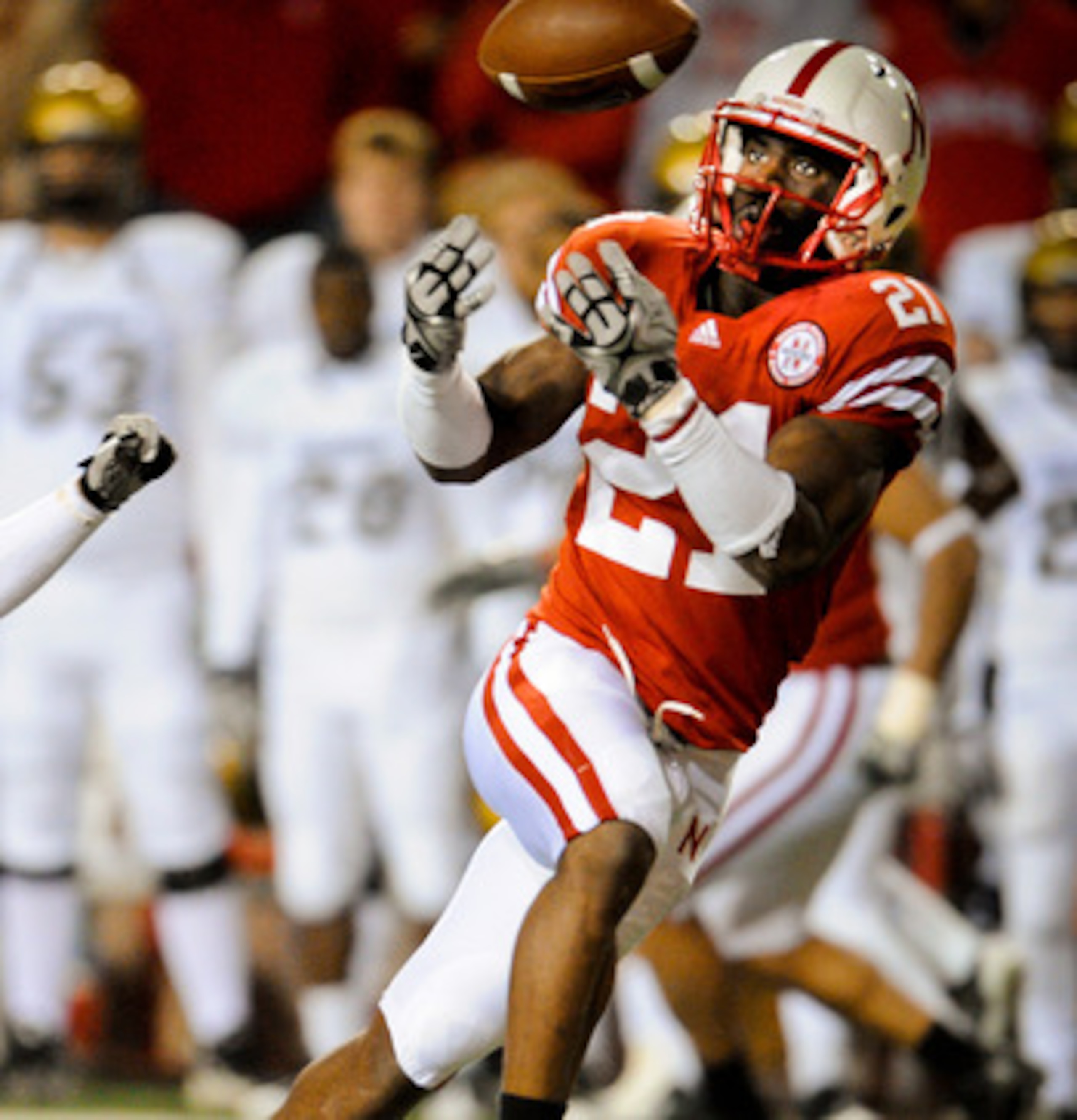 LINCOLN, NE - NOVEMBER 26: Prince Amukamara #21 of the Nebraska Cornhuskers misses a chance at an interception from Scotty McKnight #21 of the Colorado Buffaloes during the second half of their game at Memorial Stadium on November 26, 2010 in Lincoln, Neb LINCOLN, NE - NOVEMBER 26: Prince Amukamara #21 of the Nebraska Cornhuskers misses a chance at an interception from Scotty McKnight #21 of the Colorado Buffaloes during the second half of their game at Memorial Stadium on November 26, 2010 in Lincoln, Neb