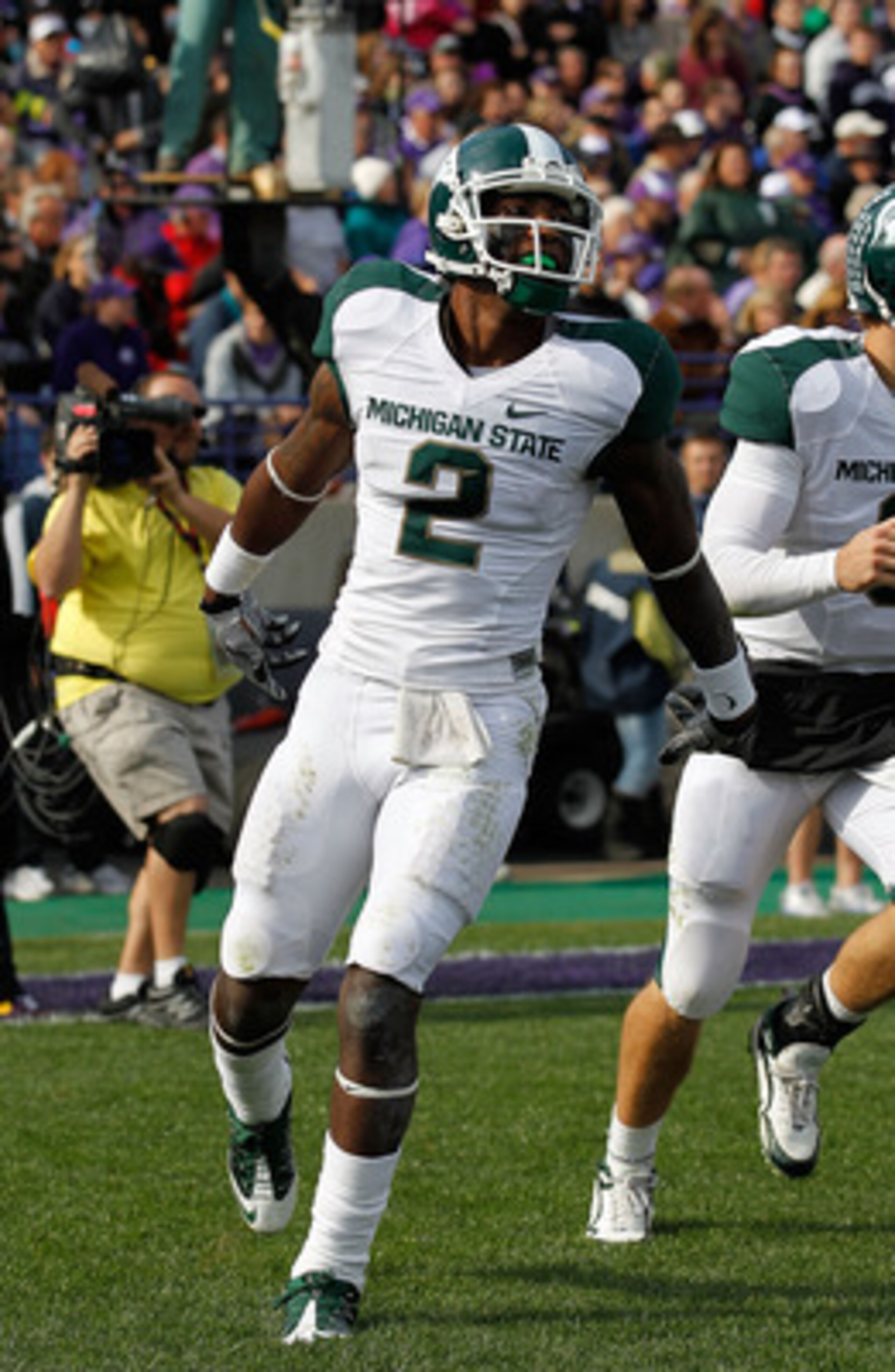 EVANSTON, IL - OCTOBER 23: Mark Dell #2 of the Michigan State Spartans celebrates a touchdown against the Northwestern Wildcats at Ryan Field on October 23, 2010 in Evanston, Illinois. Michigan State defeated Northwestern 35-27. (Photo by Jonathan Daniel/ EVANSTON, IL - OCTOBER 23: Mark Dell #2 of the Michigan State Spartans celebrates a touchdown against the Northwestern Wildcats at Ryan Field on October 23, 2010 in Evanston, Illinois. Michigan State defeated Northwestern 35-27. (Photo by Jonathan Daniel/