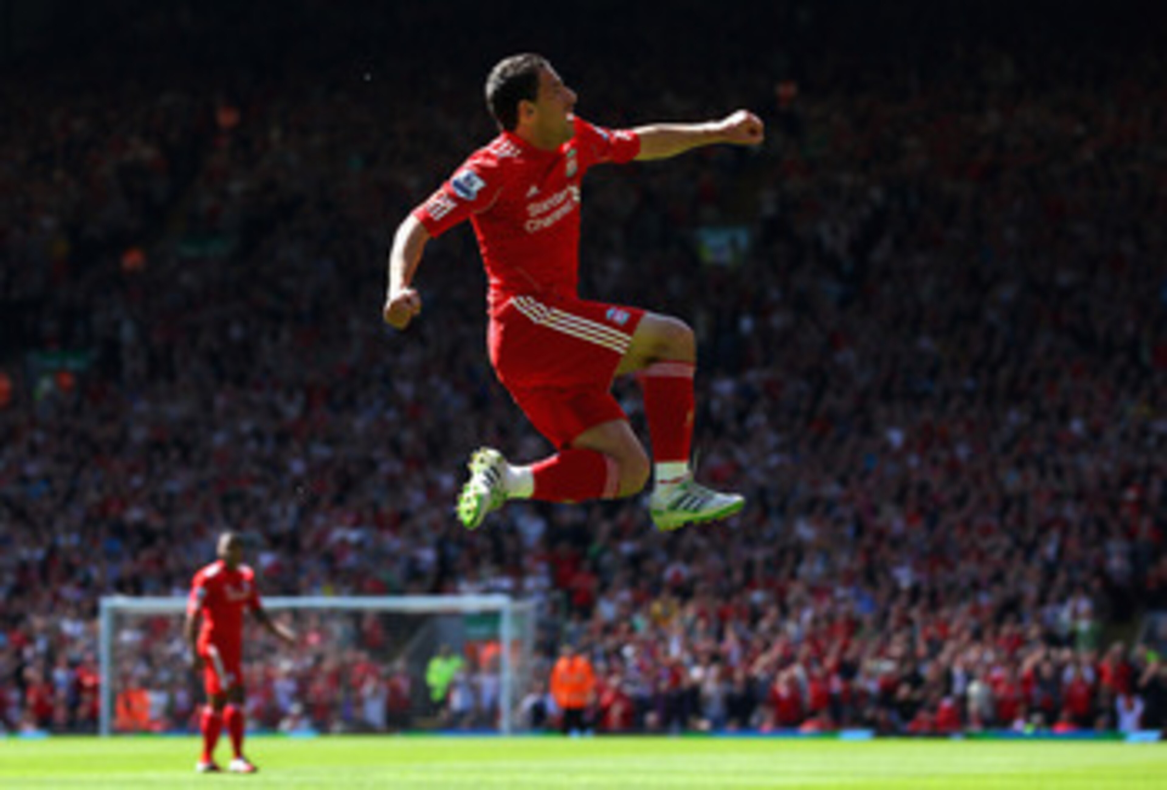 LIVERPOOL, ENGLAND - MAY 01:  Maxi Rodriguez of Liverpool leaps into the air to celebrate after scoring the first goal during the Barclays Premier League match between Liverpool  and Newcastle United at Anfield on May 1, 2011 in Liverpool, England.  (Phot
