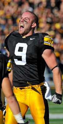 IOWA CITY, IA - OCTOBER 30- Cornerback Tyler Sash of the University of Iowa Hawkeyes celebrates after intercepting a pass during the first half of an NCAA college football game against the Michigan State Spartans at Kinnick Stadium on October 30, 2010 in