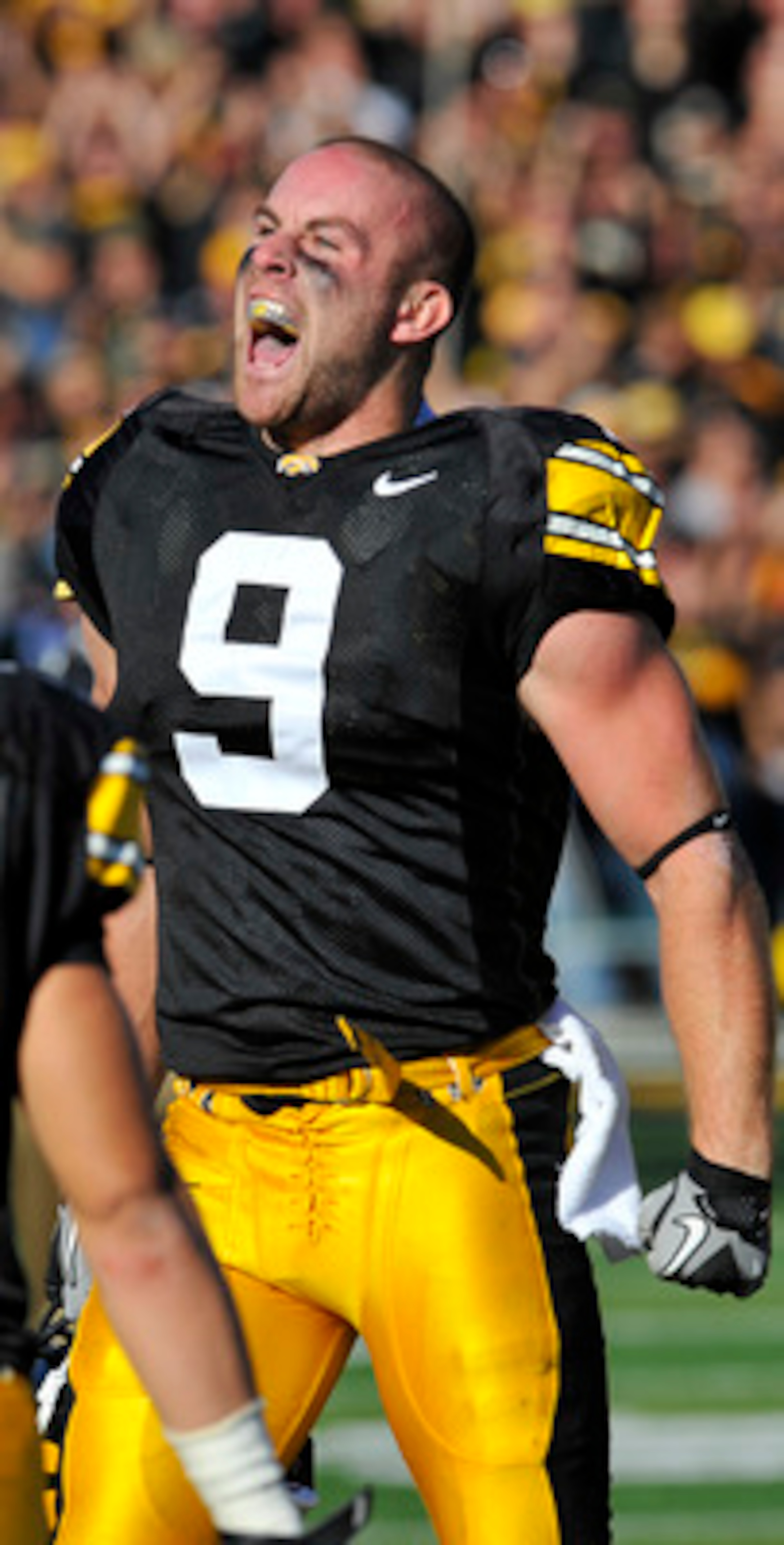 IOWA CITY, IA - OCTOBER 30- Cornerback Tyler Sash of the University of Iowa Hawkeyes celebrates after intercepting a pass during the first half of an NCAA college football game against the Michigan State Spartans at Kinnick Stadium on October 30, 2010 in