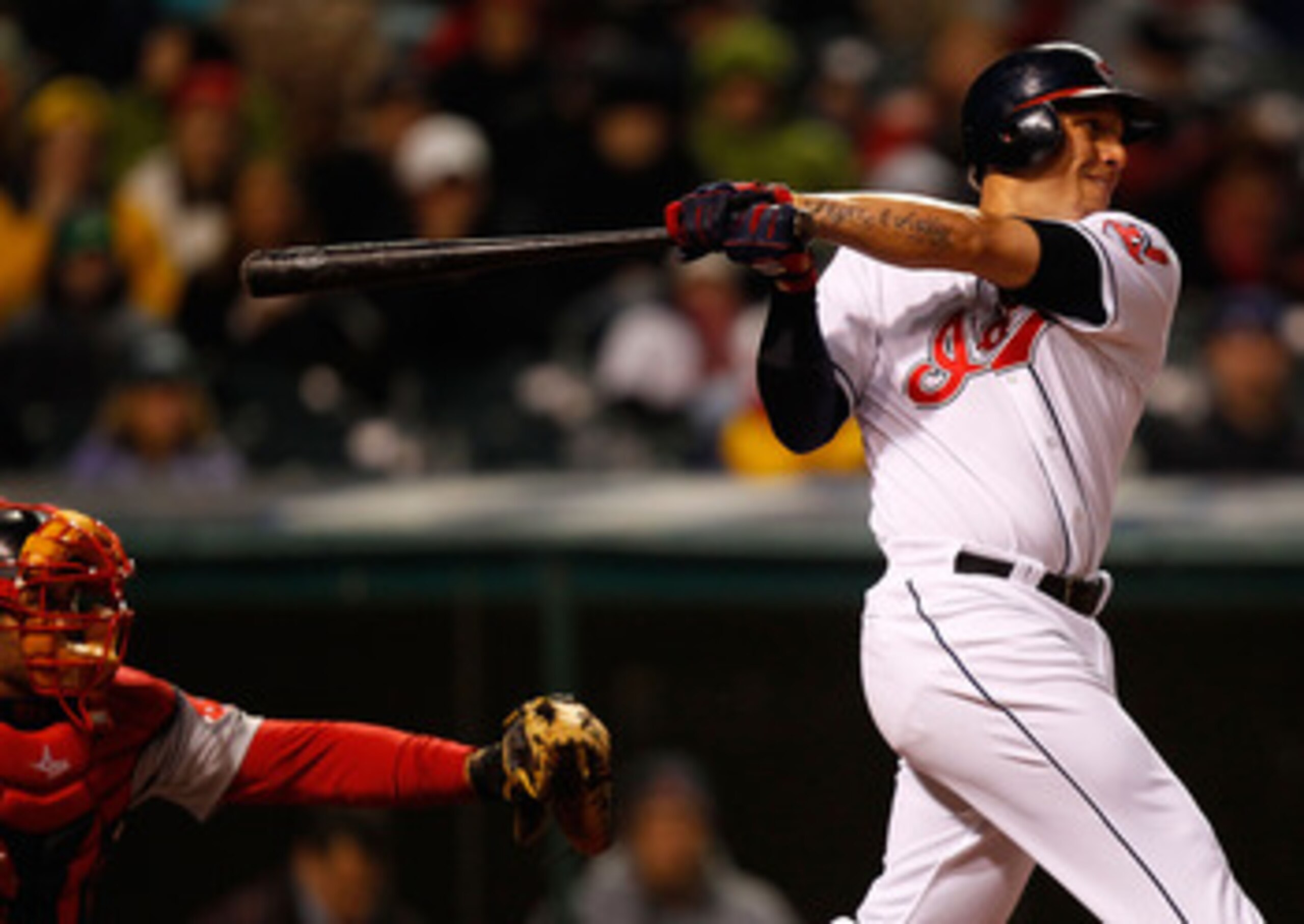 CLEVELAND - APRIL 06:  Asdrubal Cabrera #13 of the Cleveland Indians hits an RBI single off of Daisuke Matsuzaka #18 of the Boston Red Sox during the game on April 6, 2011 at Progressive Field in Cleveland, Ohio.  (Photo by Jared Wickerham/Getty Images)