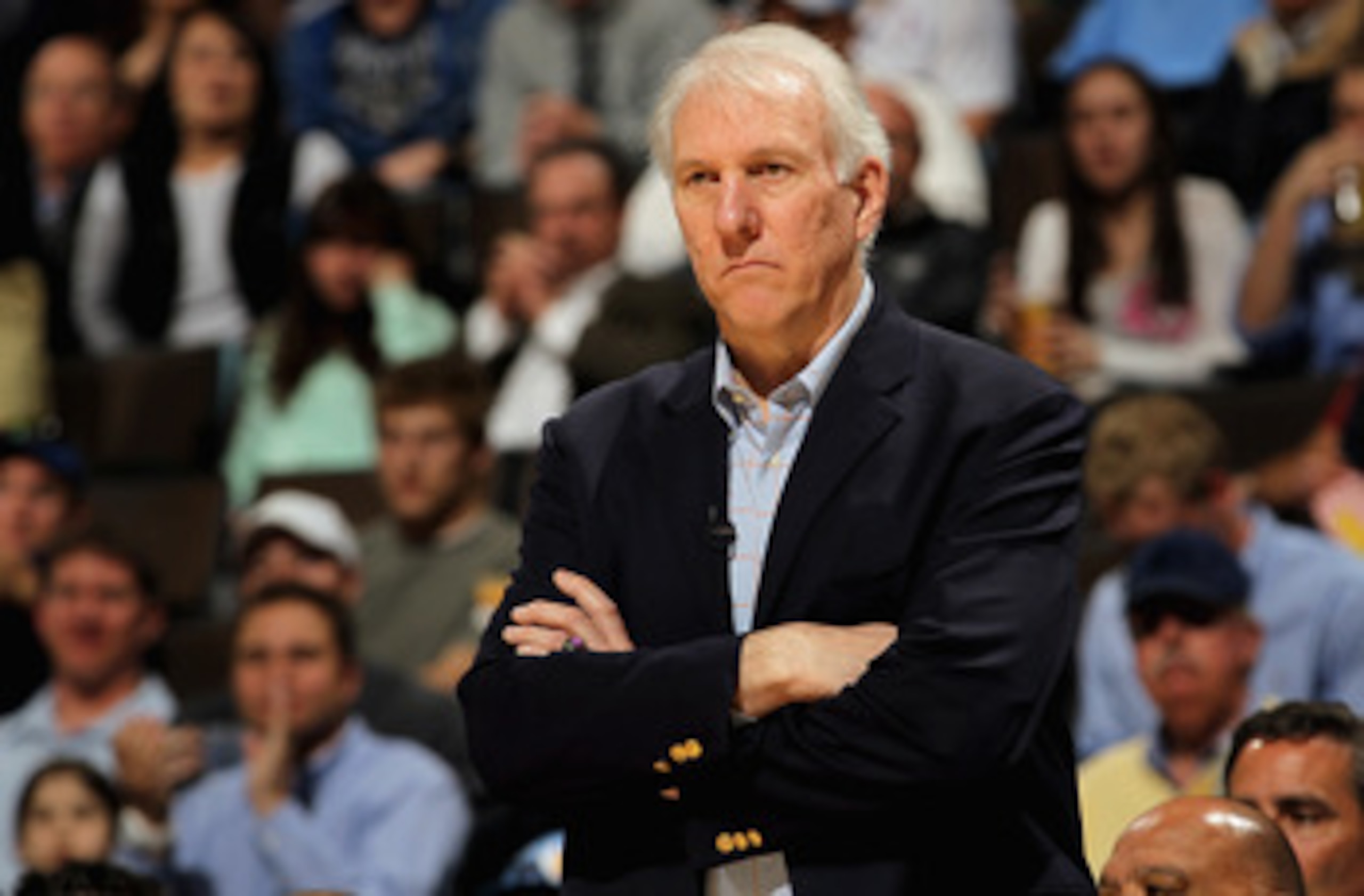 DENVER, CO - MARCH 23: Head coach Gregg Popovich of the San Antonio Spurs looks on as he leads his team against the Denver Nuggets at the Pepsi Center on March 23, 2011 in Denver, Colorado. The Nuggets defeated the Spurs 115-112. NOTE TO USER: User expre DENVER, CO - MARCH 23: Head coach Gregg Popovich of the San Antonio Spurs looks on as he leads his team against the Denver Nuggets at the Pepsi Center on March 23, 2011 in Denver, Colorado. The Nuggets defeated the Spurs 115-112. NOTE TO USER: User expre