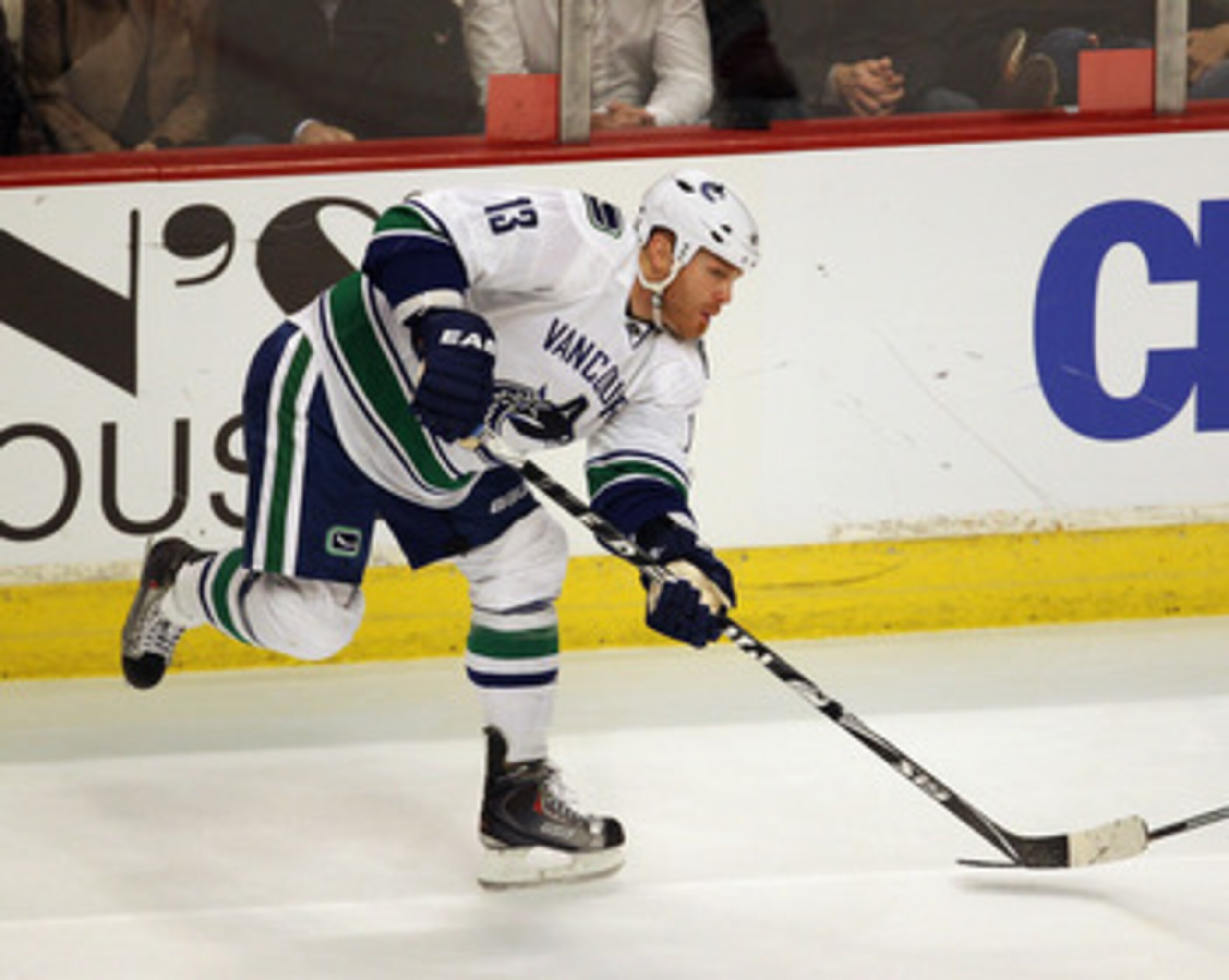 CHICAGO, IL - APRIL 17: Raffi Torres #13 of the Vancouver Canucks follows his pass against the Chicago Blackhawks in Game Three of the Western Conference Quarterfinals during the 2011 NHL Stanley Cup Playoffs at the United Center on April 17, 2011 in Chic