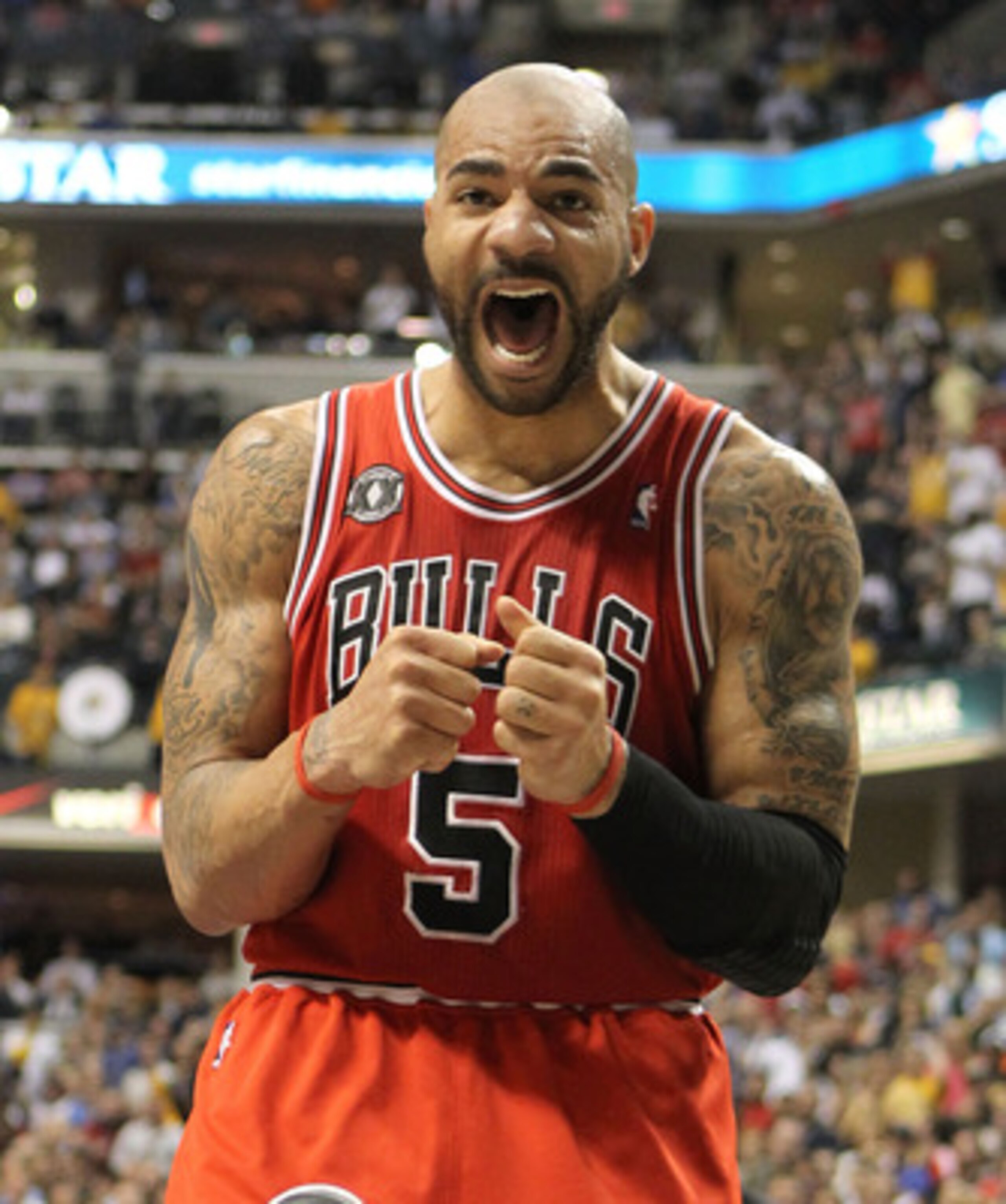 INDIANAPOLIS, IN - APRIL 21:  Carlos Boozer #5 of the Chicago Bulls reacts to a foul being called on a teammate during the game against the Indiana Pacers in Game three of the Eastern Conference Quarterfinals in the 2011 NBA Playoffs on April 21, 2011  at