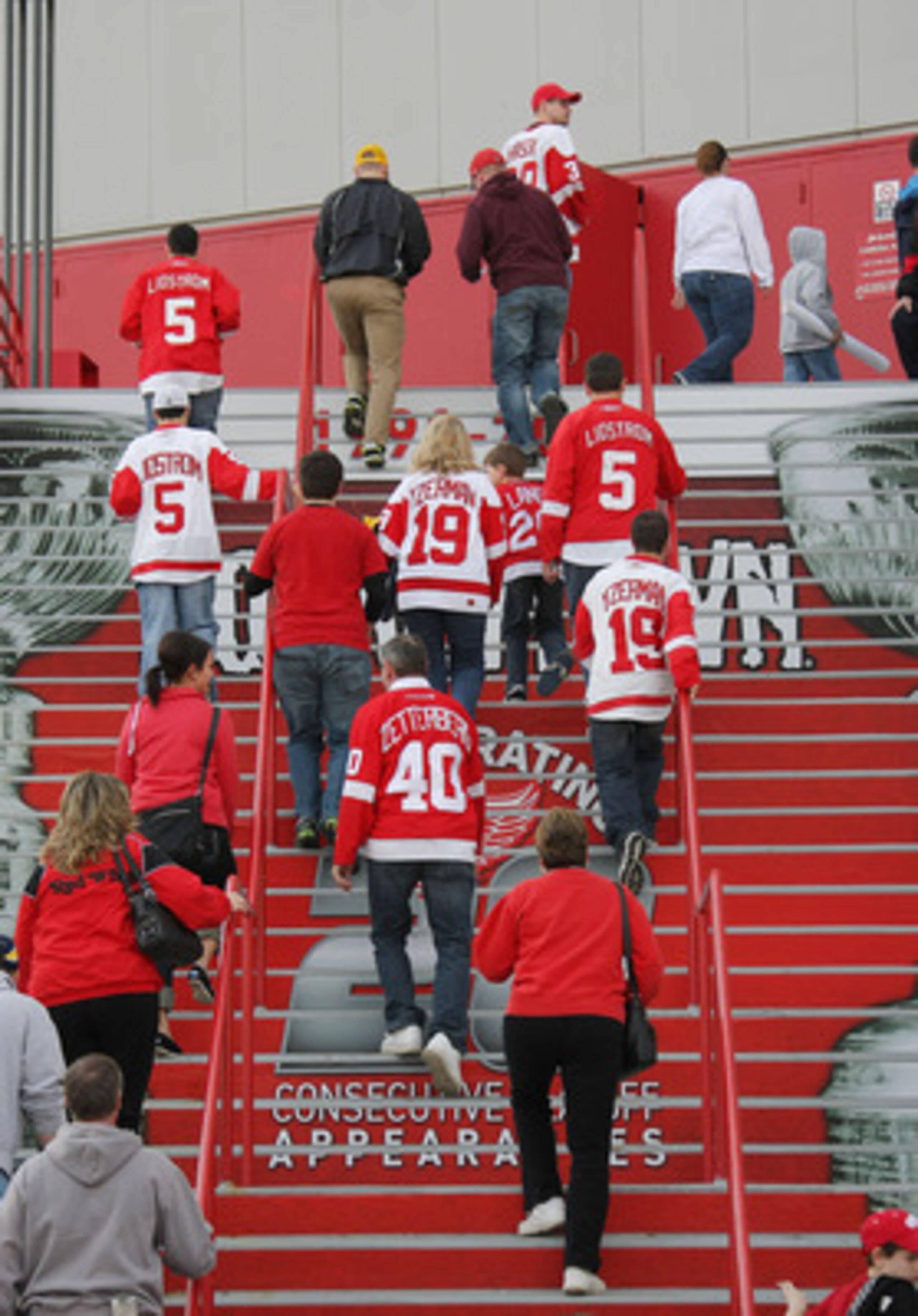 DETROIT, MI- APRIL 13: Fans file into the arena to see the Detroit Red Wings face the Phoenix Coyotes in Game One of the Western Conference Quarterfinals during the 2011 NHL Stanley Cup Playoffs at Joe Louis Arena on April 13, 2011 in Detroit, Michigan.( DETROIT, MI- APRIL 13: Fans file into the arena to see the Detroit Red Wings face the Phoenix Coyotes in Game One of the Western Conference Quarterfinals during the 2011 NHL Stanley Cup Playoffs at Joe Louis Arena on April 13, 2011 in Detroit, Michigan.(