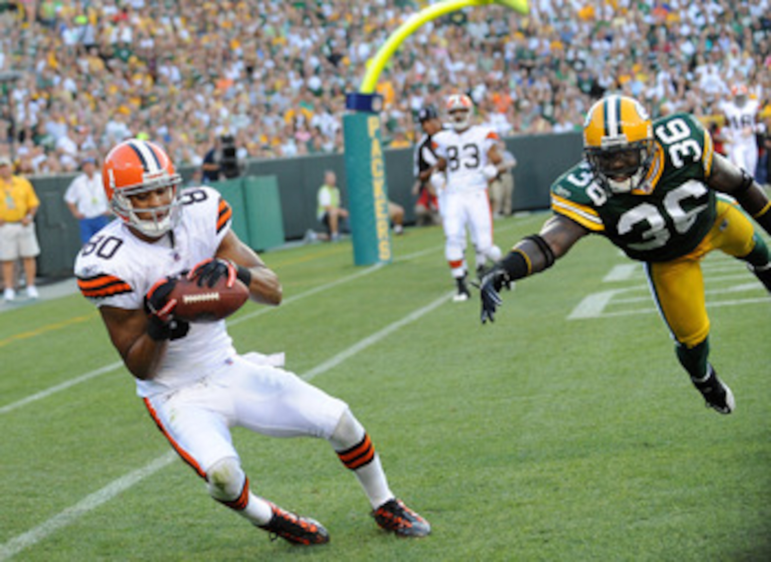 GREEN BAY - AUGUST 14: Brian Robiskie #80 of the Cleveland Browns makes a touchdown catch during the NFL preseason game against the Green Bay Packers at Lambeau Field August 14, 2010 in Green Bay, Wisconsin.  (Photo by Tom Dahlin/Getty Images)