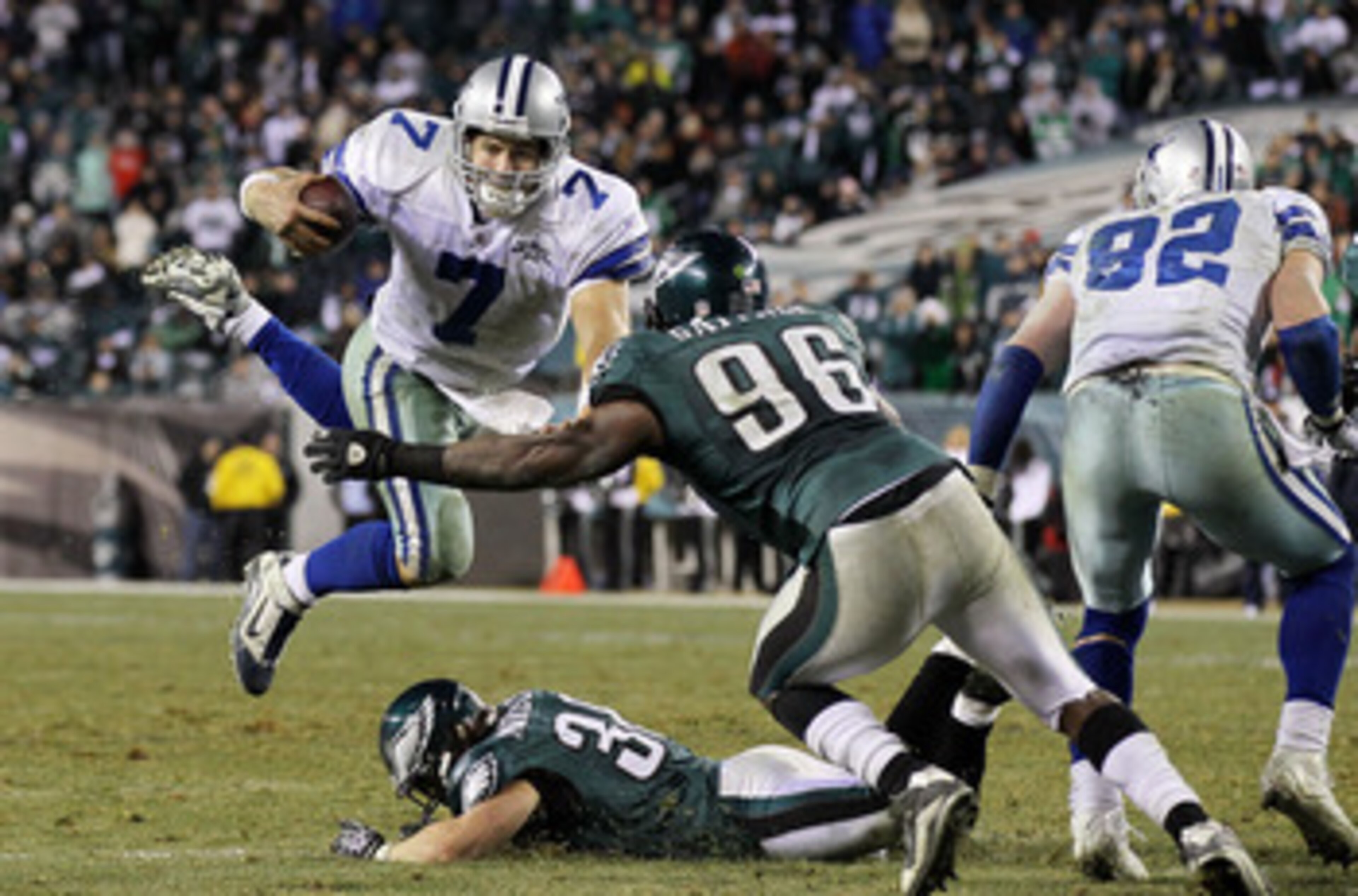 PHILADELPHIA, PA - JANUARY 02:  Stephen McGee #7 of the Dallas Cowboys runs the ball against Omar Gaither #96 of the Philadelphia Eagles on January 2, 2011 at Lincoln Financial Field in Philadelphia, Pennsylvania. The Cowboys defeated the Eagles 14-13.  (