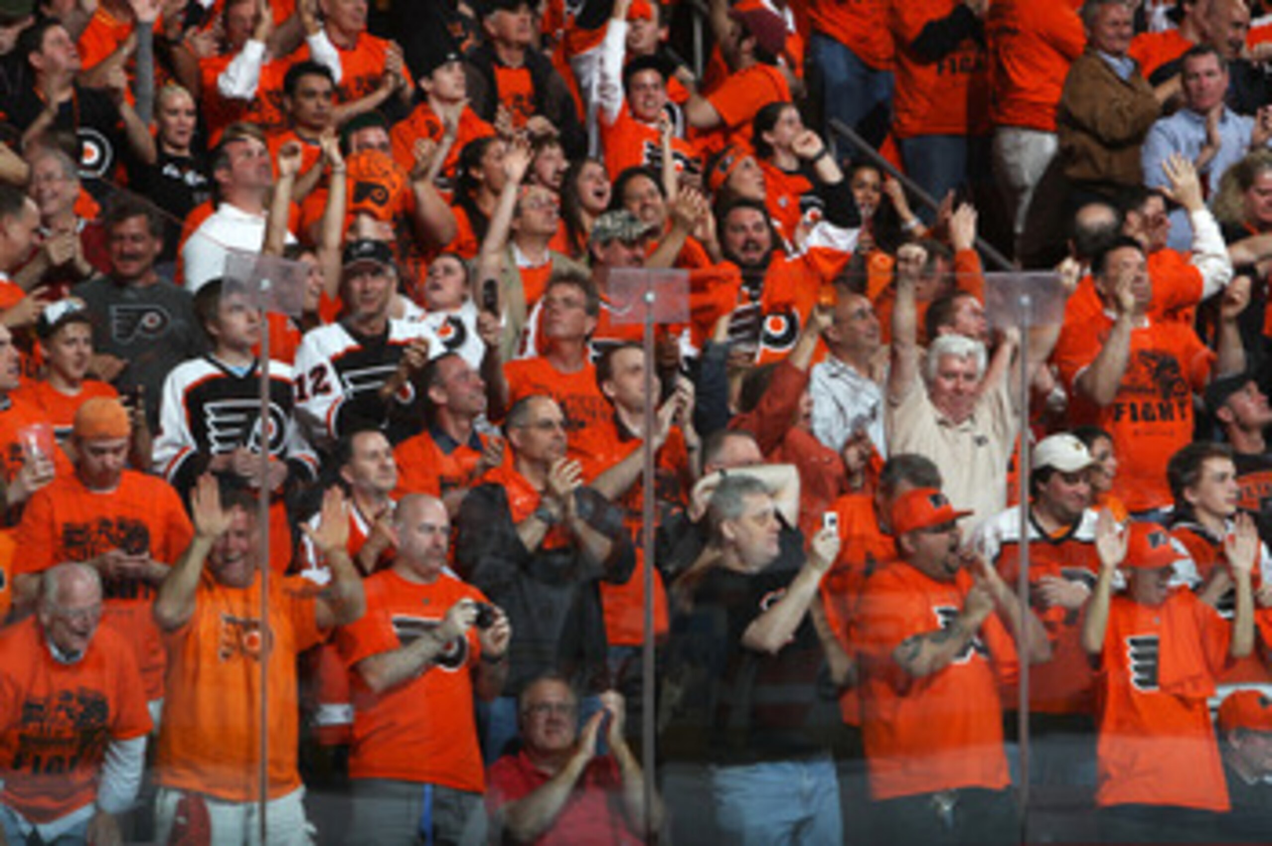 PHILADELPHIA, PA - APRIL 26: Philadelphia Flyers fans celebrate during the second period of their game against the Buffalo Sabres in Game Seven of the Eastern Conference Quarterfinals during the 2011 NHL Stanley Cup Playoffs at Wells Fargo Center on Apri PHILADELPHIA, PA - APRIL 26: Philadelphia Flyers fans celebrate during the second period of their game against the Buffalo Sabres in Game Seven of the Eastern Conference Quarterfinals during the 2011 NHL Stanley Cup Playoffs at Wells Fargo Center on Apri