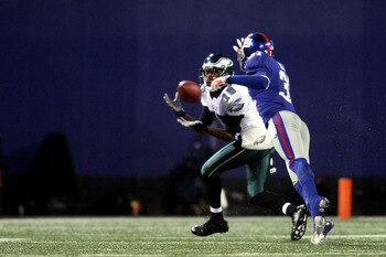 EAST RUTHERFORD, NJ - DECEMBER 13:  DeSean Jackson #10 of the Philadelphia Eagles catches a ball on his way to scoring a touchdown against Aaron Ross #31 of the New York Giants at Giants Stadium on December 13, 2009 in East Rutherford, New Jersey.  (Photo