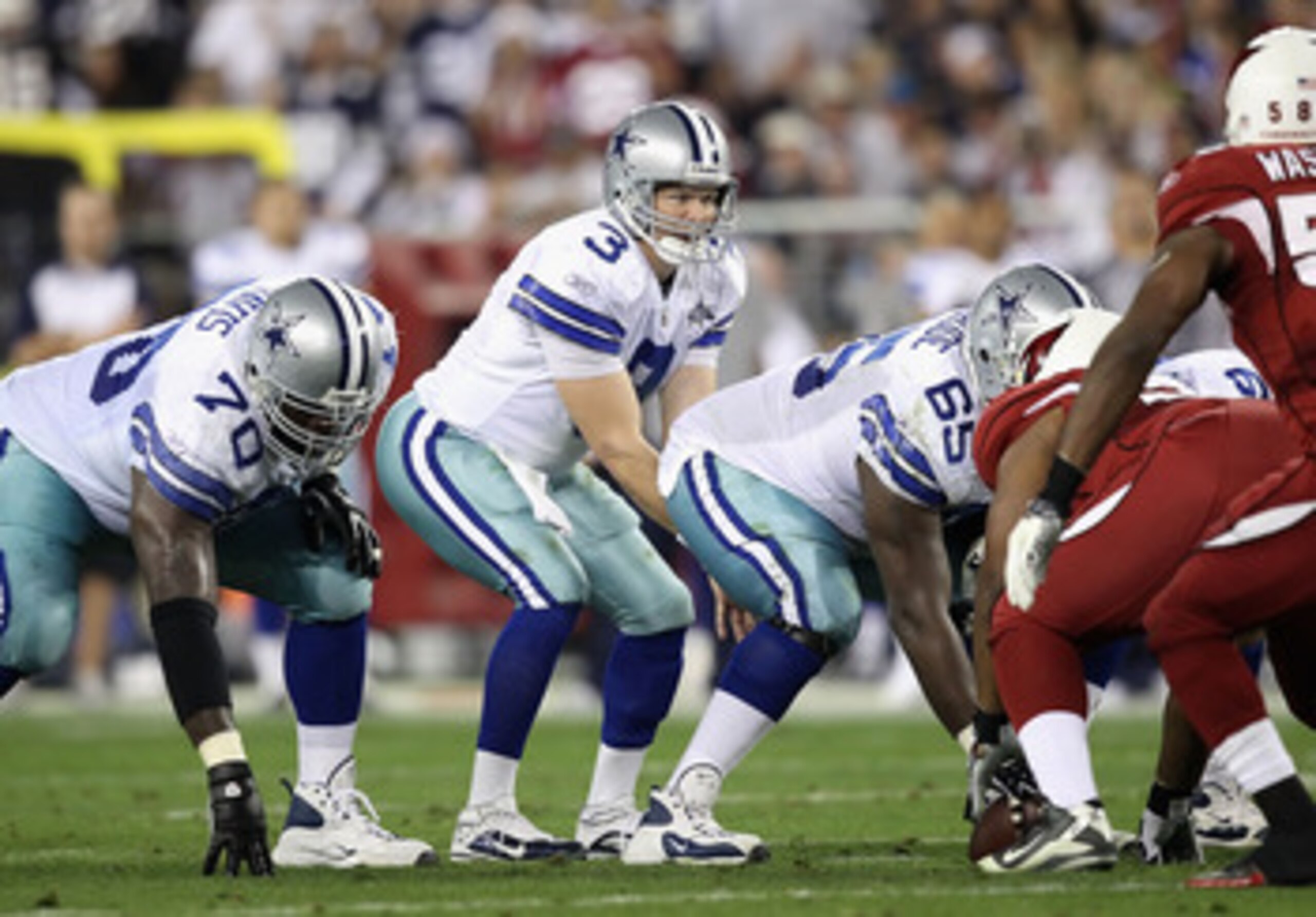 GLENDALE, AZ - DECEMBER 25:  Quarterback Jon Kitna #3 of the Dallas Cowboys prepares to snap the ball during the NFL game against the Arizona Cardinals at the University of Phoenix Stadium on December 25, 2010 in Glendale, Arizona.  The Cardinals defeated