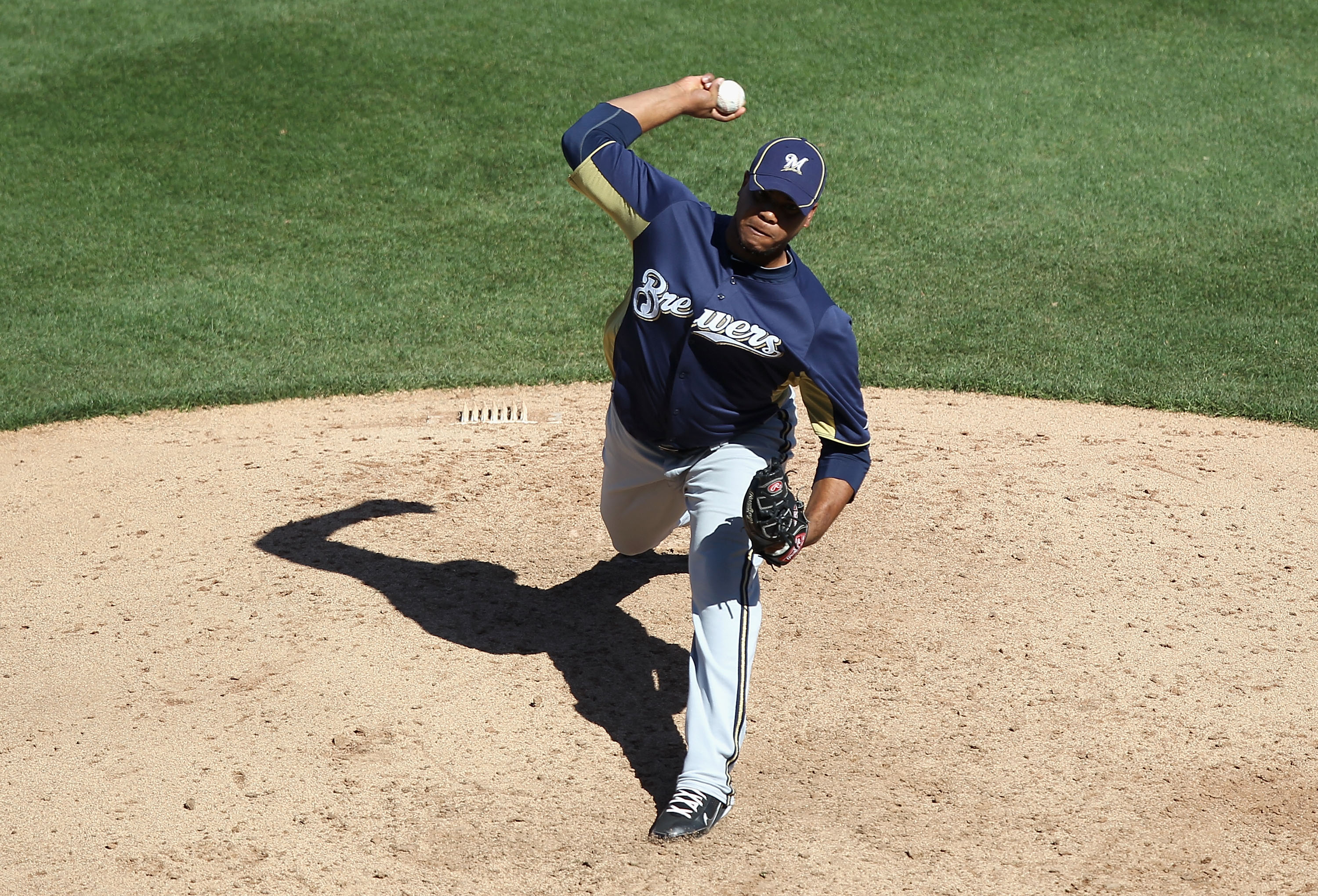 SCOTTSDALE, AZ - MARCH 09:  Relief pitcher Wily Peralta #73 of the Milwaukee Brewers pitches against the Arizona Diamondbacks during the spring training game at Salt River Fields at Talking Stick on March 9, 2011 in Scottsdale, Arizona.  (Photo by Christi
