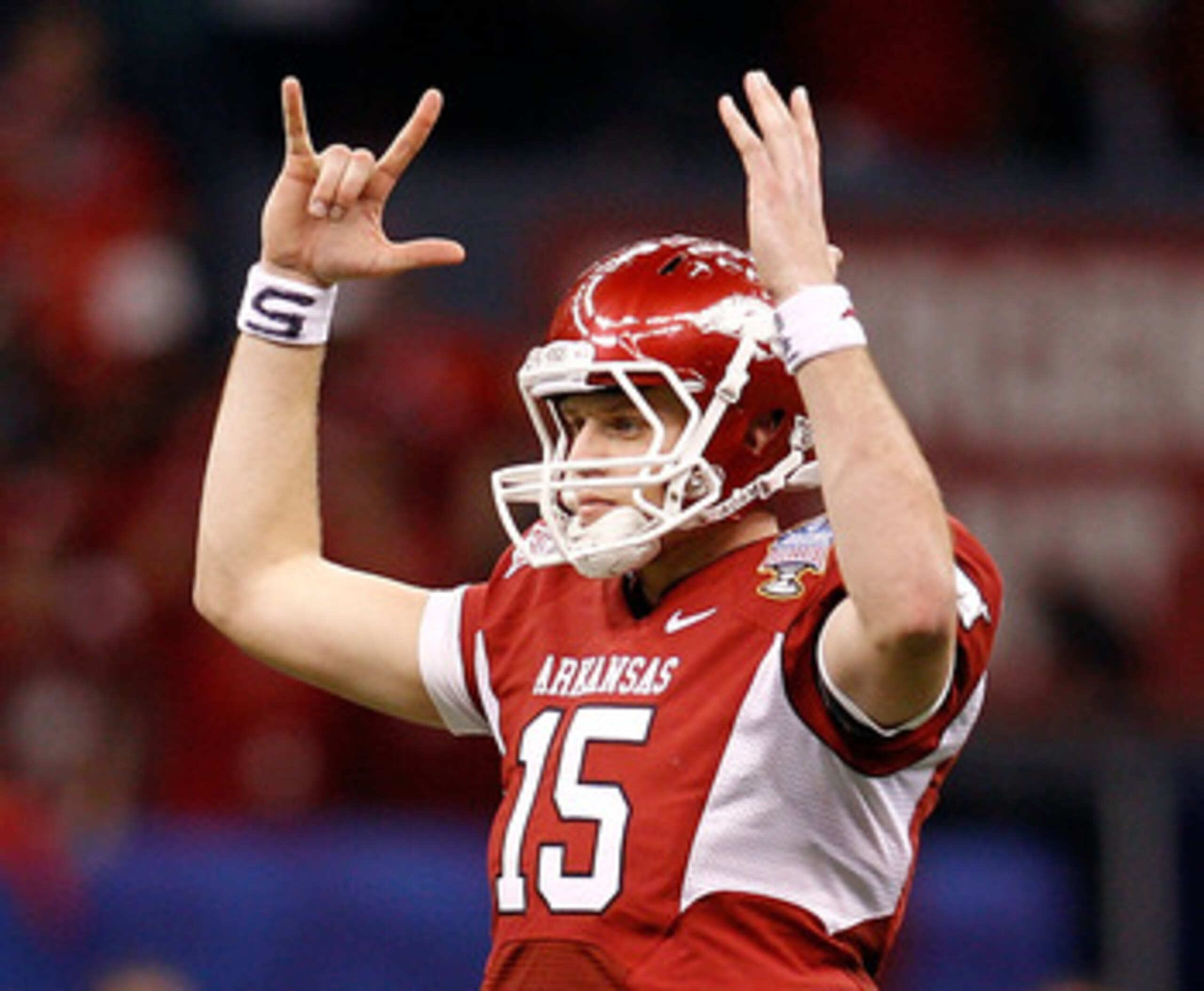 NEW ORLEANS, LA - JANUARY 04:  Quarterback Ryan Mallett #15 of the Arkansas Razorbacks reacts after throwing a 22-yard touchdown to Jarius Wright #4 against Devon Torrence #1 of the Ohio State Buckeyes in the third quarter during the Allstate Sugar Bowl a