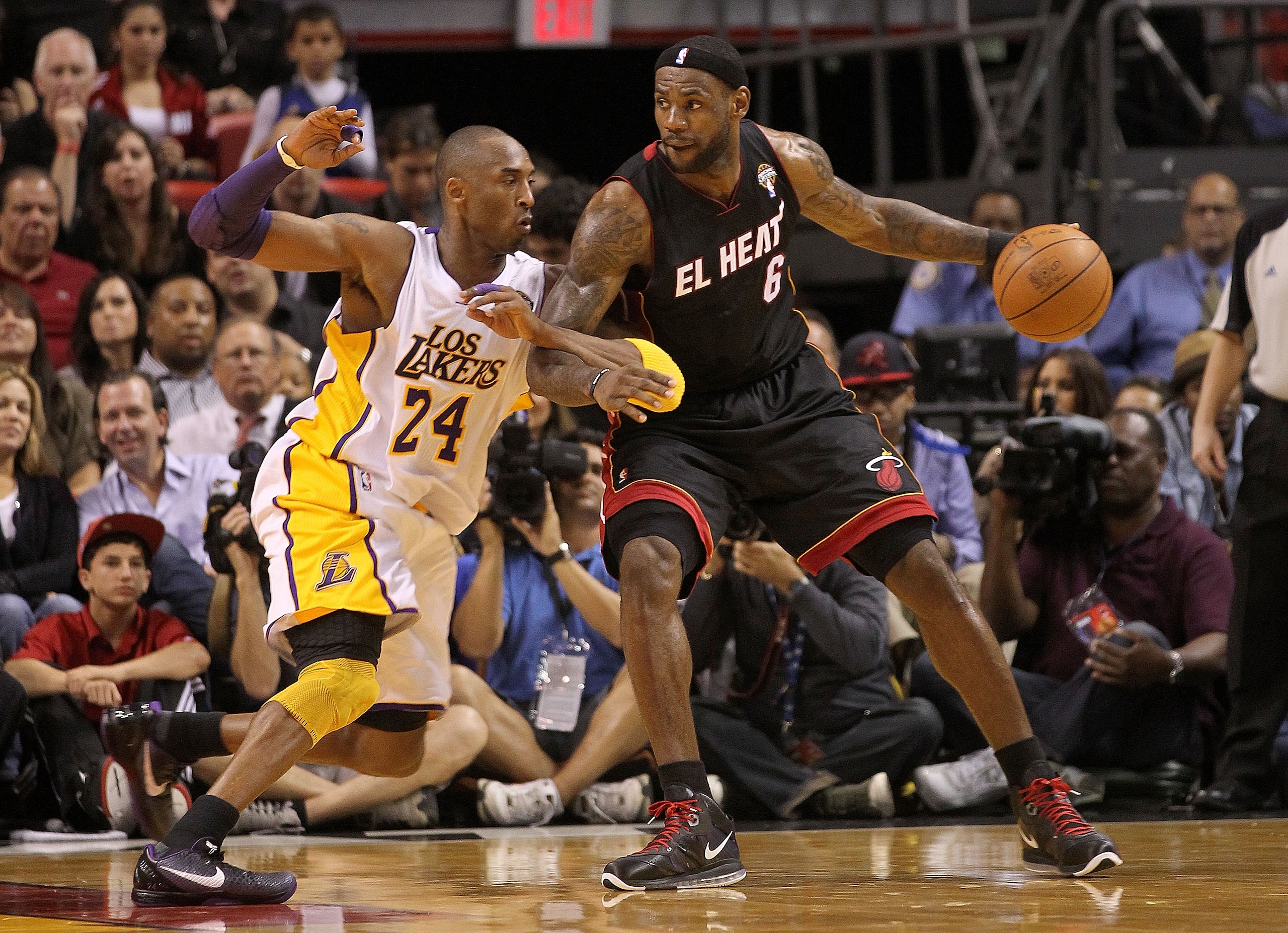 MIAMI, FL - MARCH 10:  LeBron James #6 of the Miami Heat posts up Kobe Bryant #24 of  the Los Angeles Lakers  during a game at American Airlines Arena on March 10, 2011 in Miami, Florida. NOTE TO USER: User expressly acknowledges and agrees that, by downl