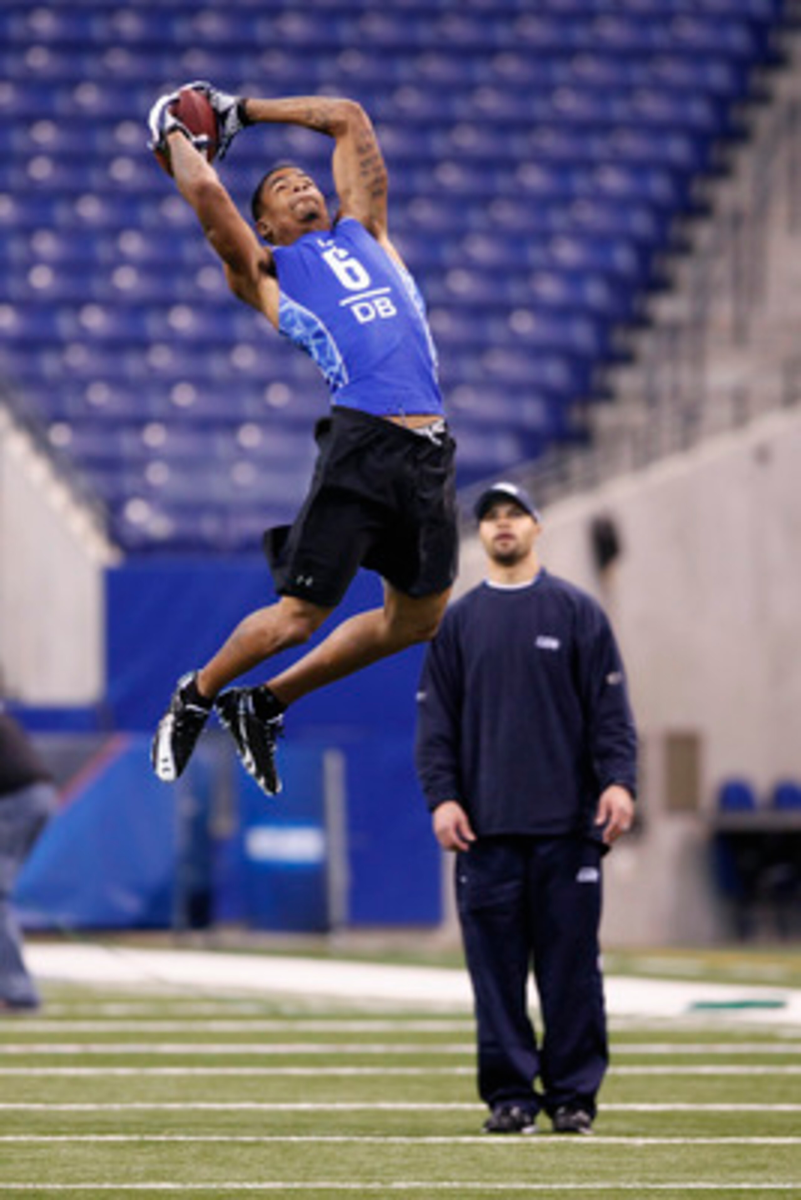 INDIANAPOLIS, IN - MARCH 1: Defensive back Curtis Brown #6 of Texas goes up for a pass during the 2011 NFL Scouting Combine at Lucas Oil Stadium on February 28, 2011 in Indianapolis, Indiana. (Photo by Joe Robbins/Getty Images)