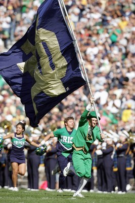 SOUTH BEND, IN - OCTOBER 07:  The mascot of Notre Dame Fighting Irish carries the flag onto the field during the game against the Stanford Cardinal on October 7, 2006 at Notre Dame Stadium in South Bend, Indiana. (Photo by Andy Lyons/Getty Images)
