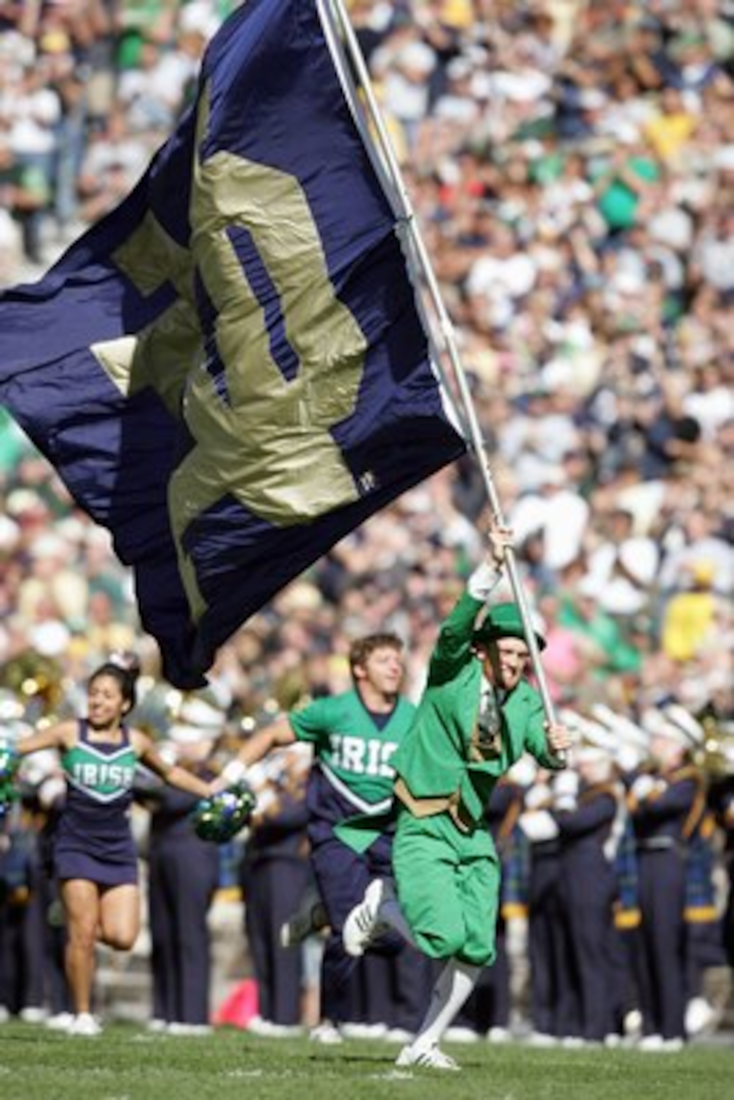 SOUTH BEND, IN - OCTOBER 07: The mascot of Notre Dame Fighting Irish carries the flag onto the field during the game against the Stanford Cardinal on October 7, 2006 at Notre Dame Stadium in South Bend, Indiana. (Photo by Andy Lyons/Getty Images) SOUTH BEND, IN - OCTOBER 07: The mascot of Notre Dame Fighting Irish carries the flag onto the field during the game against the Stanford Cardinal on October 7, 2006 at Notre Dame Stadium in South Bend, Indiana. (Photo by Andy Lyons/Getty Images)