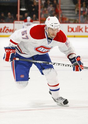 OTTAWA, CANADA - APRIL 07:  Benoit Pouliot #57 of the Montreal Canadiens skates up ice in a game against the Ottawa Senators at Scotiabank Place on April 7, 2011 in Ottawa, Canada.  (Photo by Phillip MacCallum/Getty Images)