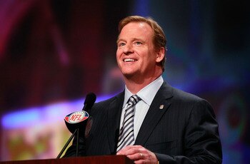 NEW YORK, NY - APRIL 28:  NFL Commissioner Roger Goodell (L) poses for a photo with Julio Jones, #6 overall pick by the Atlanta Falcons, holds up a jersey on stage during the 2011 NFL Draft at Radio City Music Hall on April 28, 2011 in New York City.  (Ph