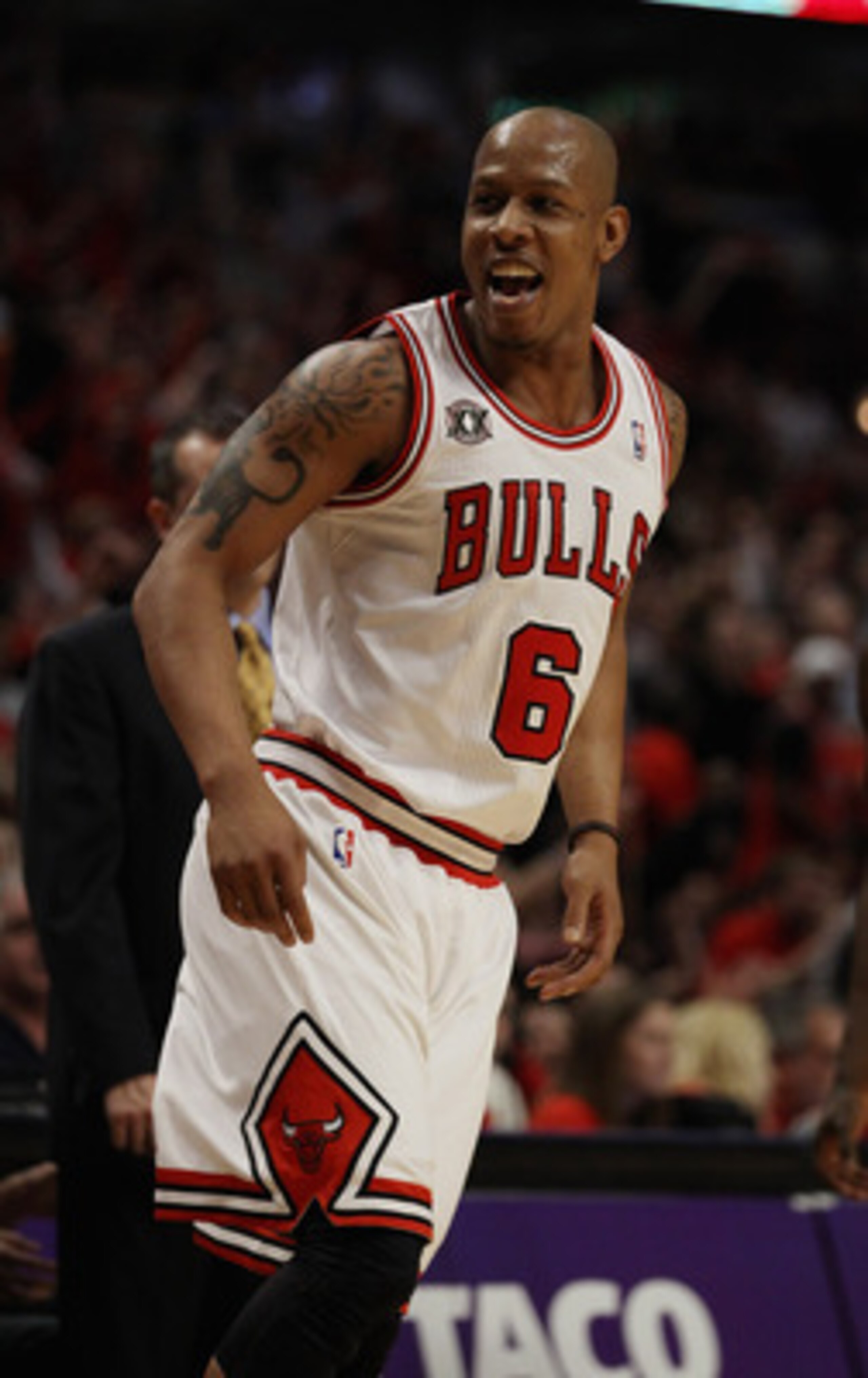 CHICAGO, IL - APRIL 26: Keith Bogans #6 of the Chicago Bulls talks to members of the Indiana Pacers sitting on the bench after hitting a three-point shot in Game Five of the Eastern Conference Quarterfinals in the 2011 NBA Playoffs at the United Center on