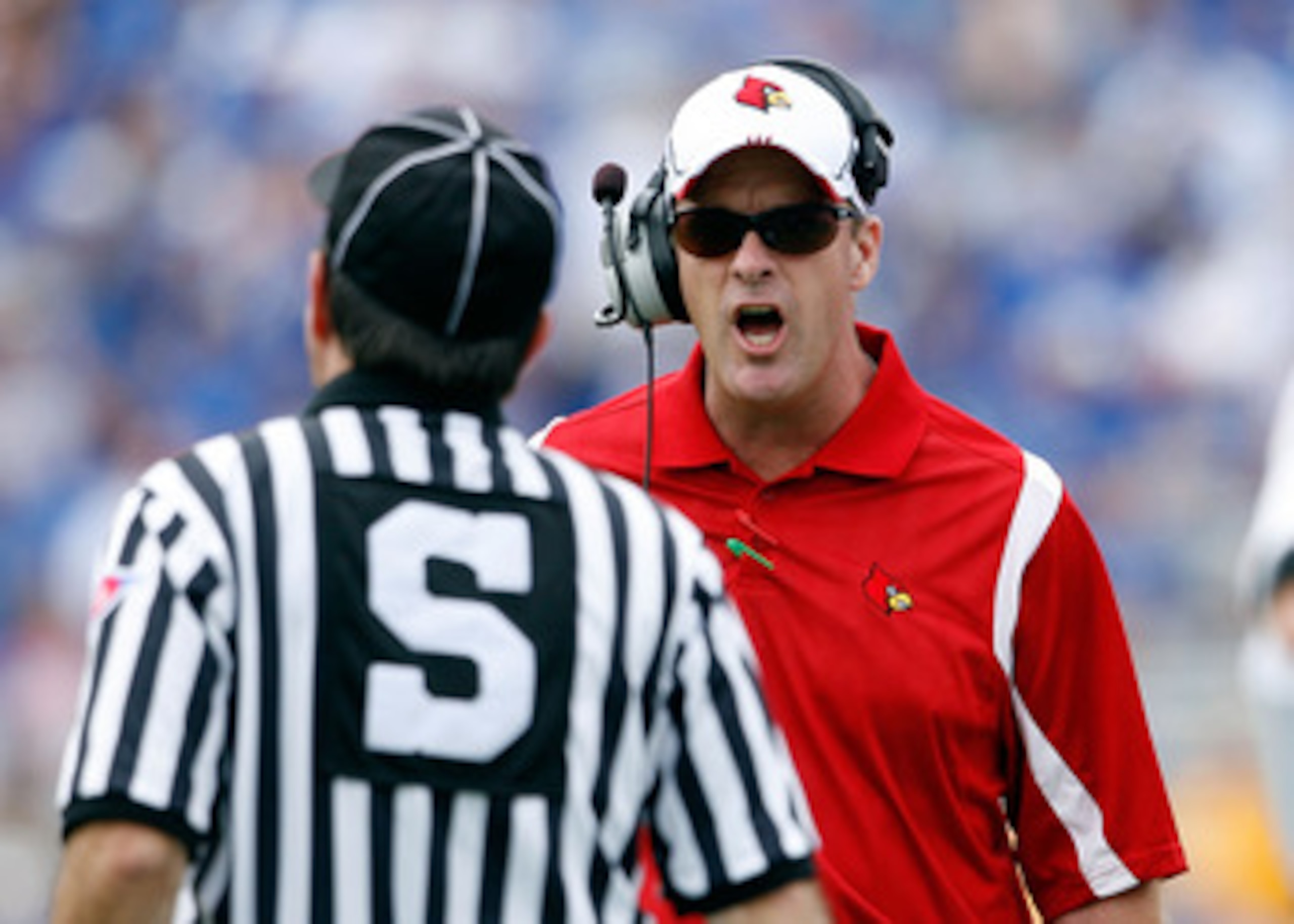 LEXINGTON, KY - SEPTEMBER 19:  Steve Kragthorpe the Head Coach of the Louisville Cardinals gives an offical his opinion during the game against the Kentucky Wildcats at Commonwealth Stadium on September 19, 2009 in Lexington, Kentucky.  (Photo by Andy Lyo