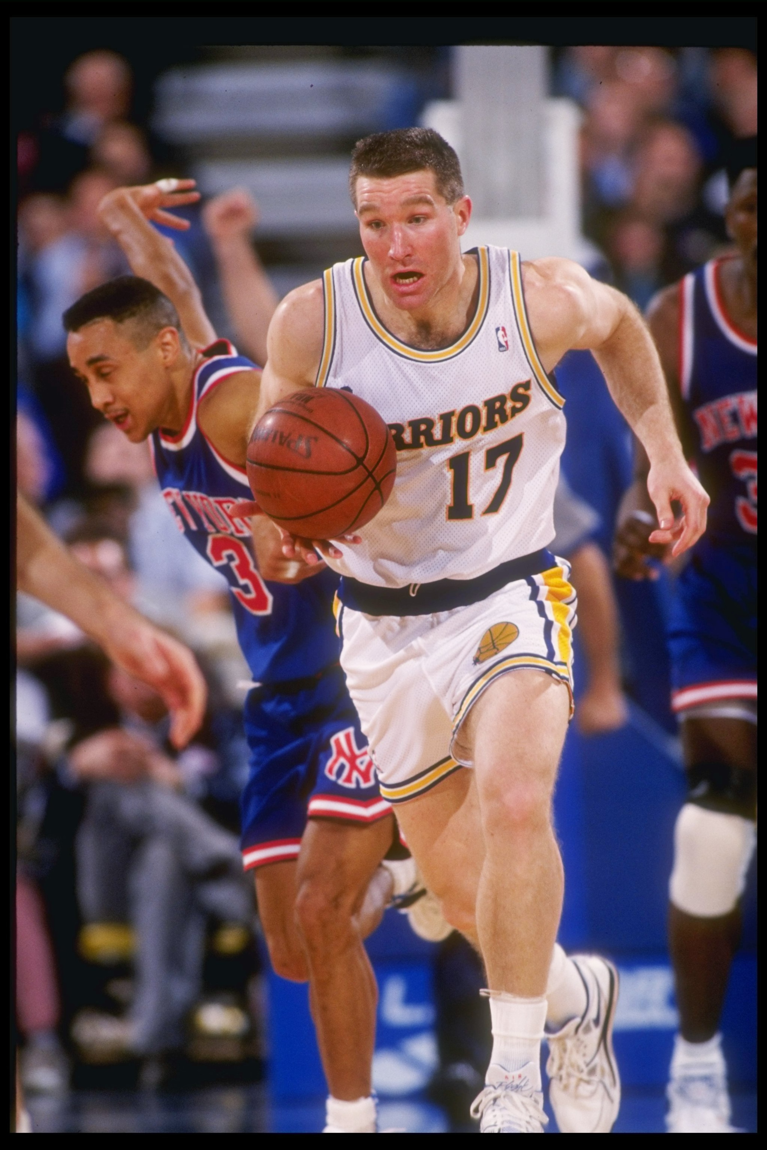 1990-1991:  Forward Chris Mullin of the Golden State Warriors in action during a game against the New York Knicks. Mandatory Credit: Otto Greule  /Allsport