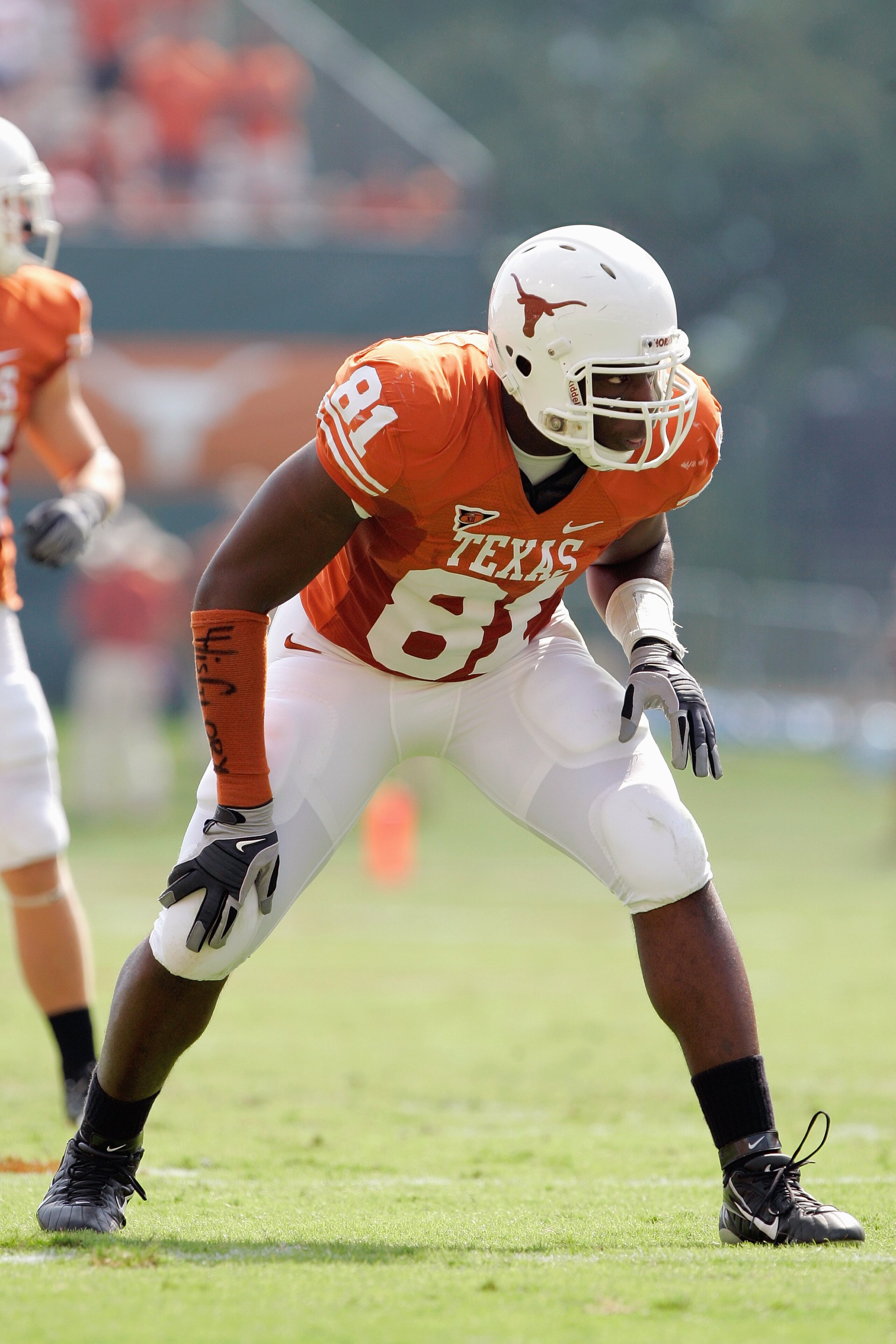 AUSTIN, TX - SEPTEMBER 27:  Sam Acho #81 of the Texas Longhorns gets ready on the field during the game against the Arkansas Razorbacks on September 27, 2008 at Darrell K Royal-Texas Memorial Stadium in Austin, Texas.  Texas won 52-10.  (Photo by Brian Ba