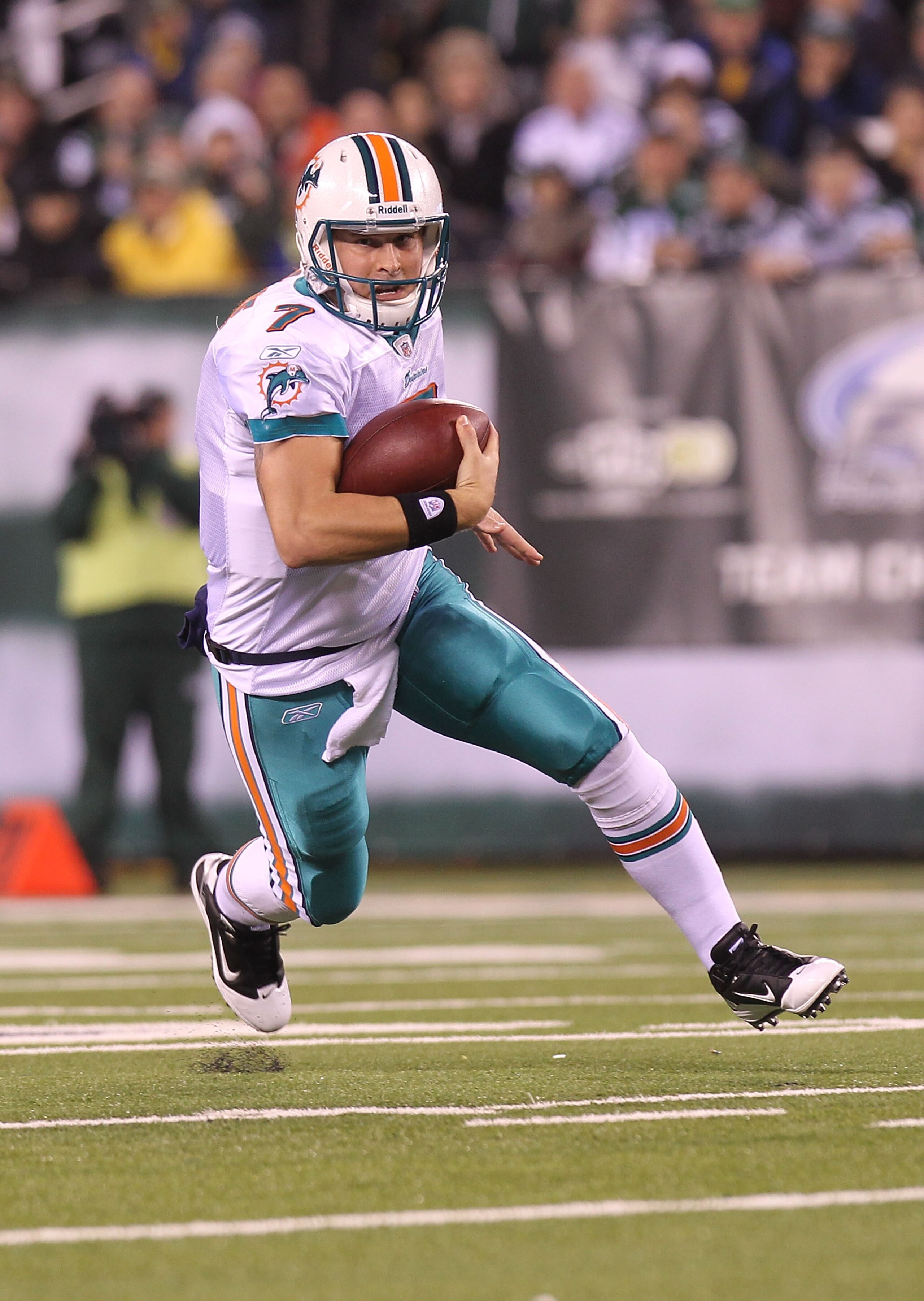 EAST RUTHERFORD, NJ - DECEMBER 12:  Chad Henne #7 of the Miami Dolphins scrambles from the pocket against the New York Jets at New Meadowlands Stadium on December 12, 2010 in East Rutherford, New Jersey.  (Photo by Nick Laham/Getty Images)