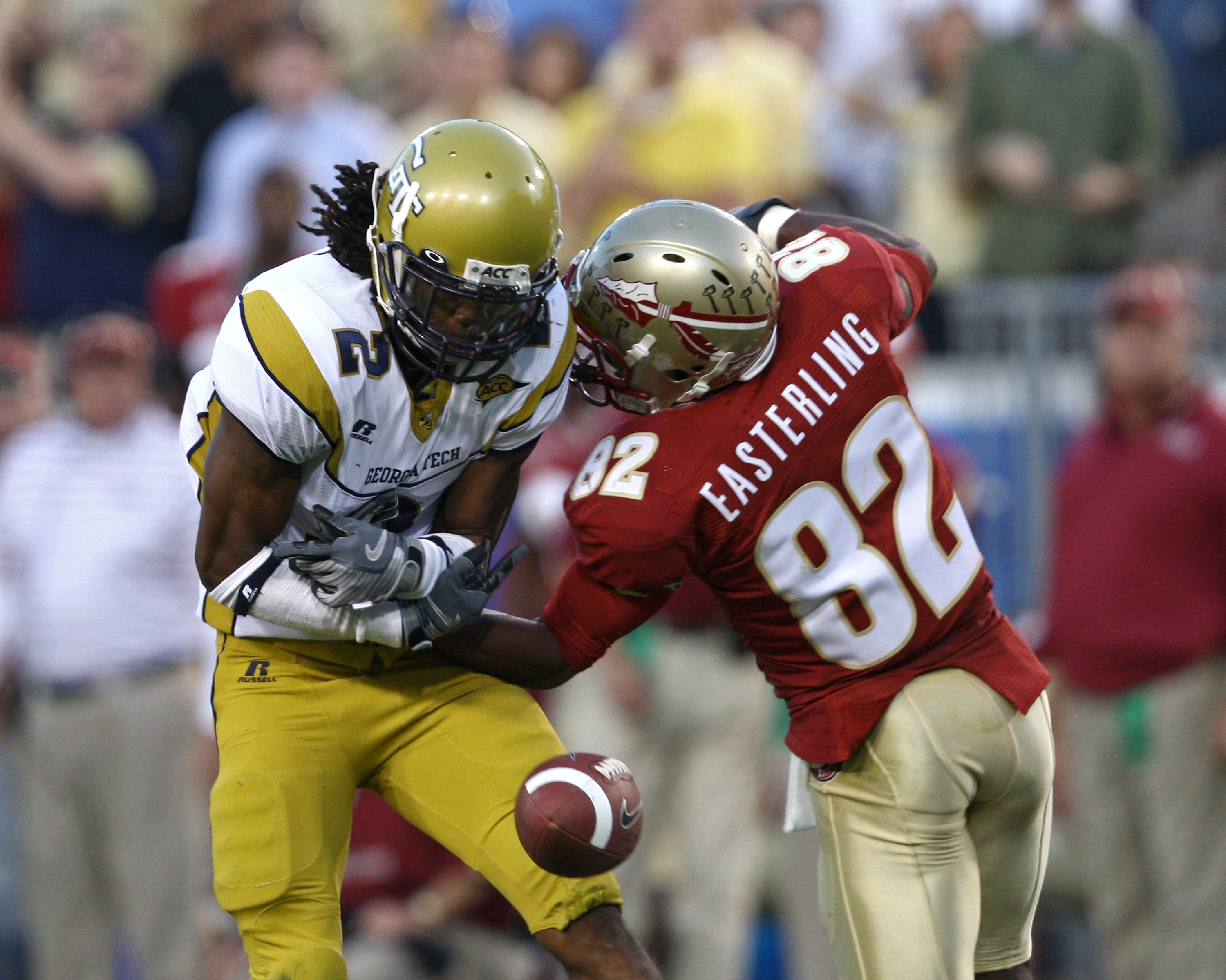 ATLANTA - NOVEMBER 1:  Cornerback Mario Butler #2 of the Georgia Tech Yellow Jackets breaks up a pass intended for wide receiver Taiwan Easterling #82 of the Florida State Seminoles during the game at Bobby Dodd Stadium at Historic Grant Field on November