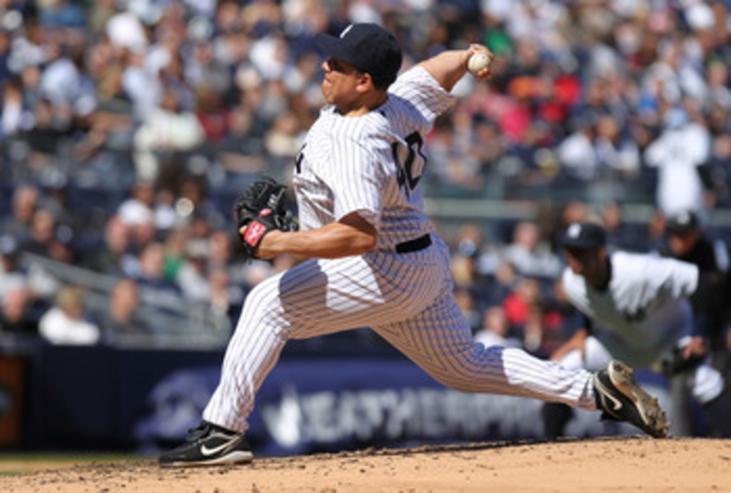 NEW YORK, NY - APRIL 03:  Bartolo Colon #40 of the New York Yankees against the Detroit Tigers at Yankee Stadium on April 3, 2011 in the Bronx borough of New York City.  (Photo by Nick Laham/Getty Images)