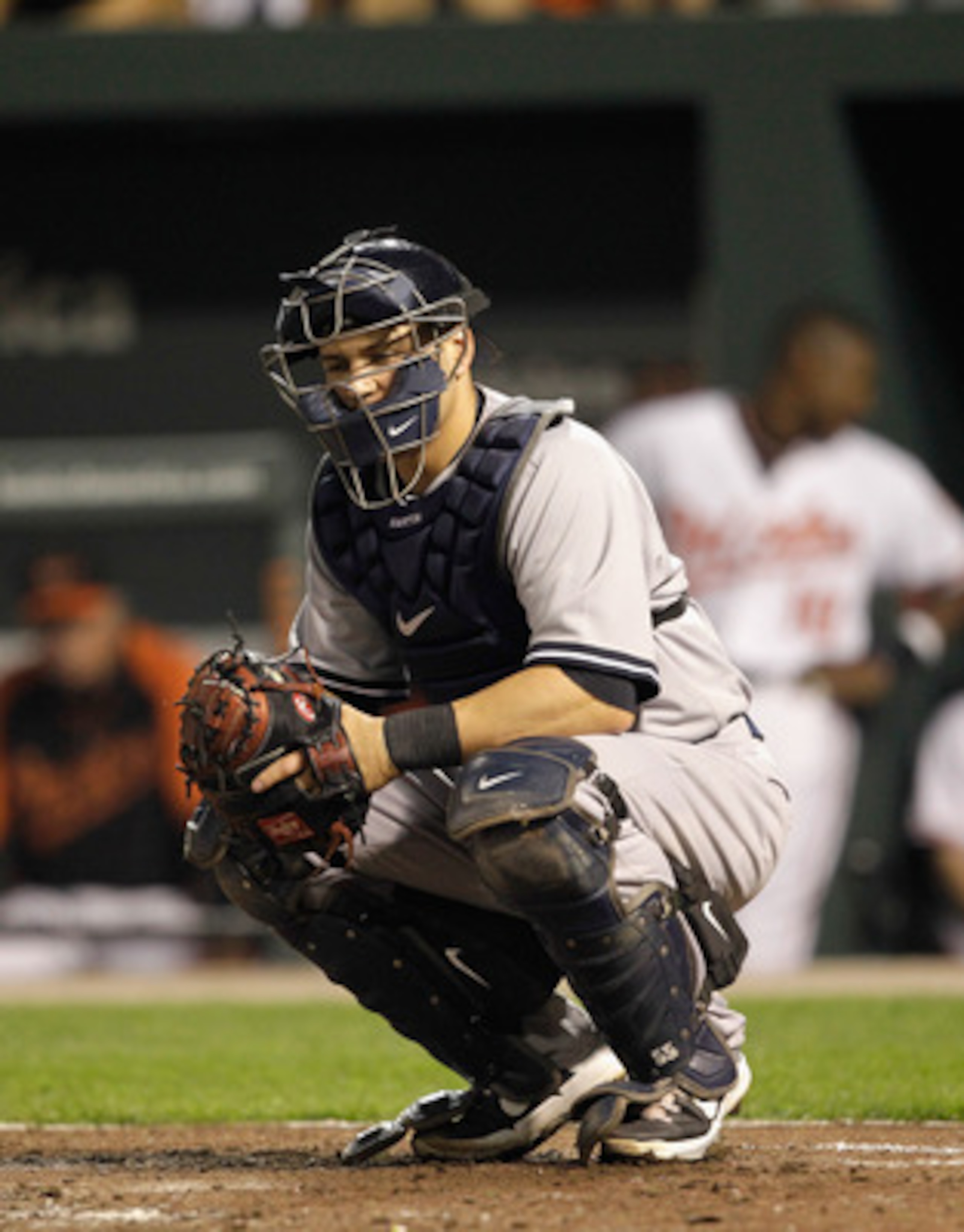 BALTIMORE, MD - APRIL 23:  Catcher Russell Martin #55 of the New York Yankees in action against the Baltimore Orioles at Oriole Park at Camden Yards on April 23, 2011 in Baltimore, Maryland.  (Photo by Rob Carr/Getty Images)